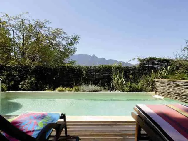 Swimming pool in Demeure d'Hôtes L'Hermitage