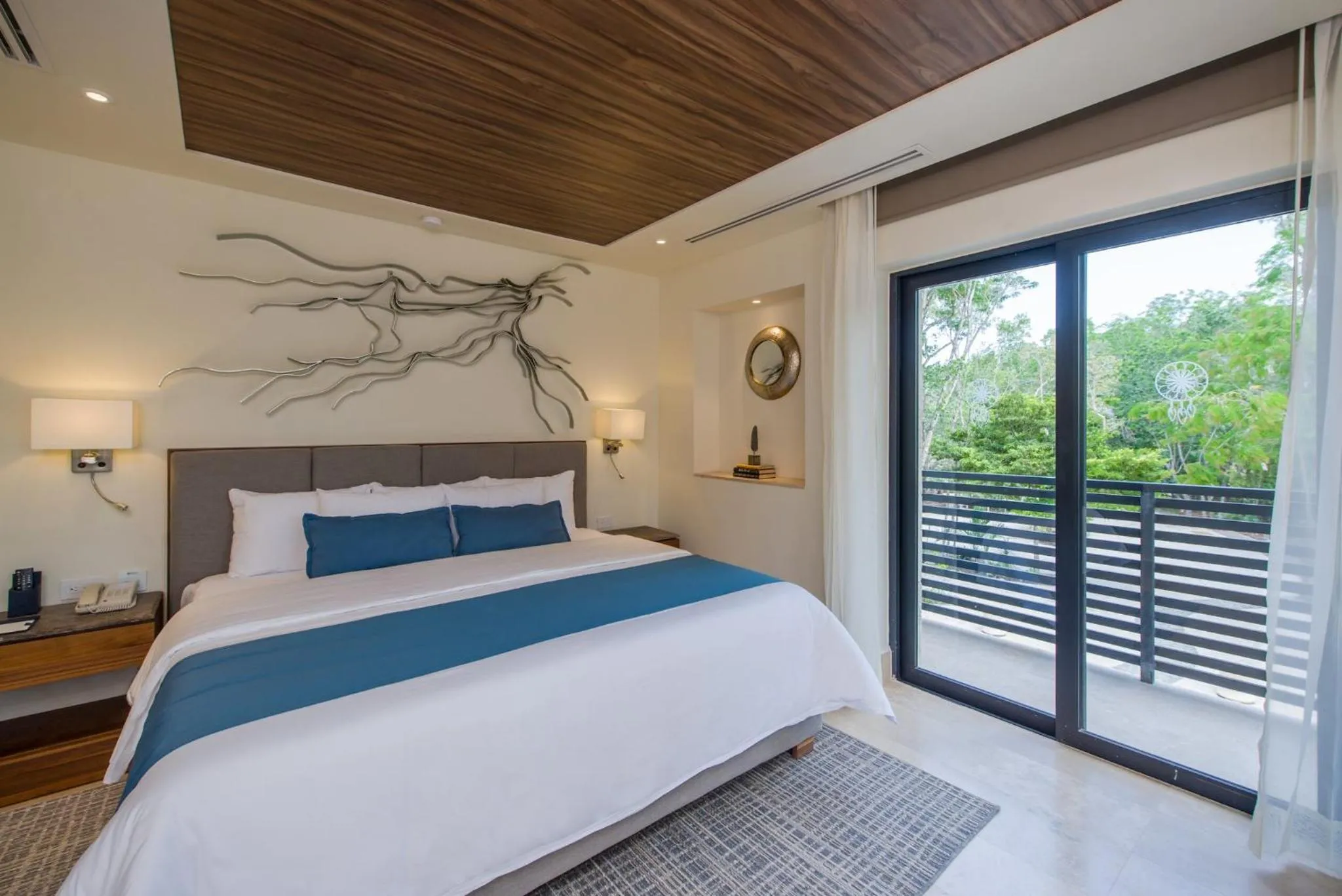 Bedroom in Naay Tulum Curamoria Collection