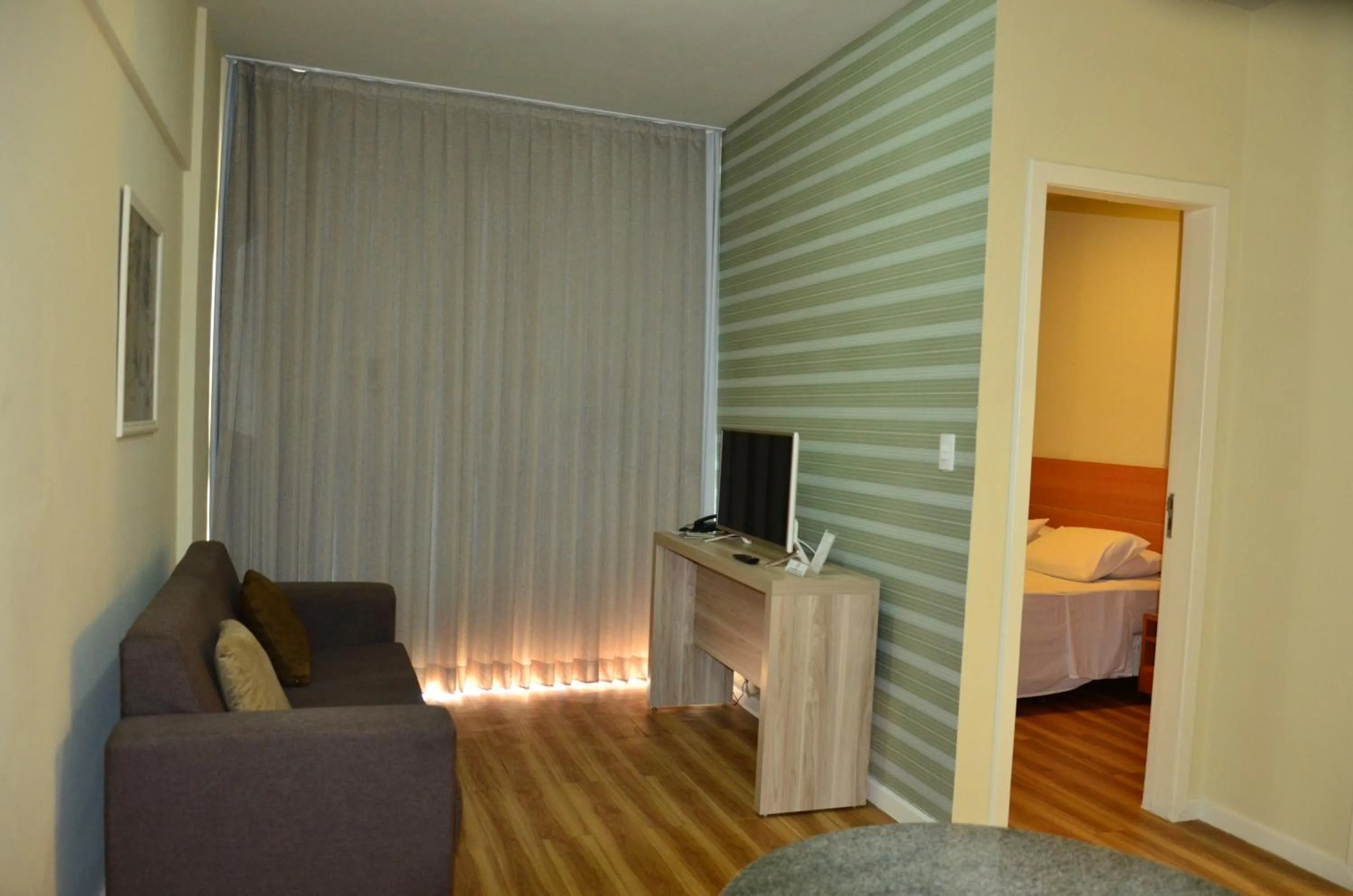 Seating area, Bed in Classe Apart Hotel