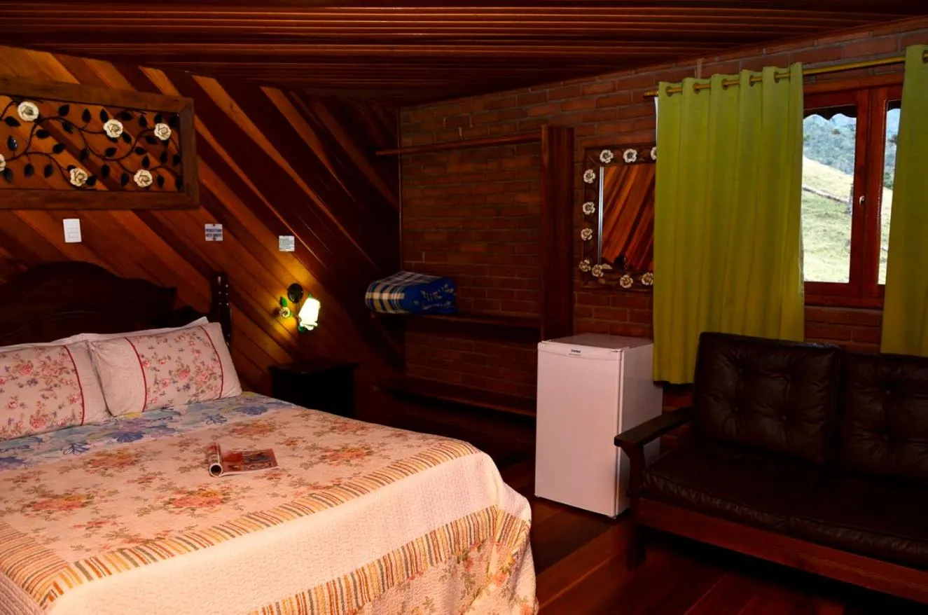 Bed in Pousada do Mirante