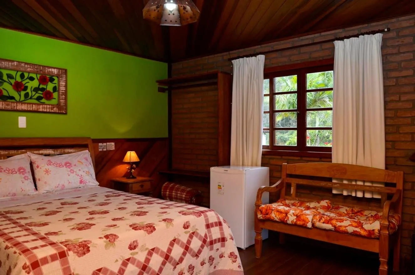 Bed in Pousada do Mirante