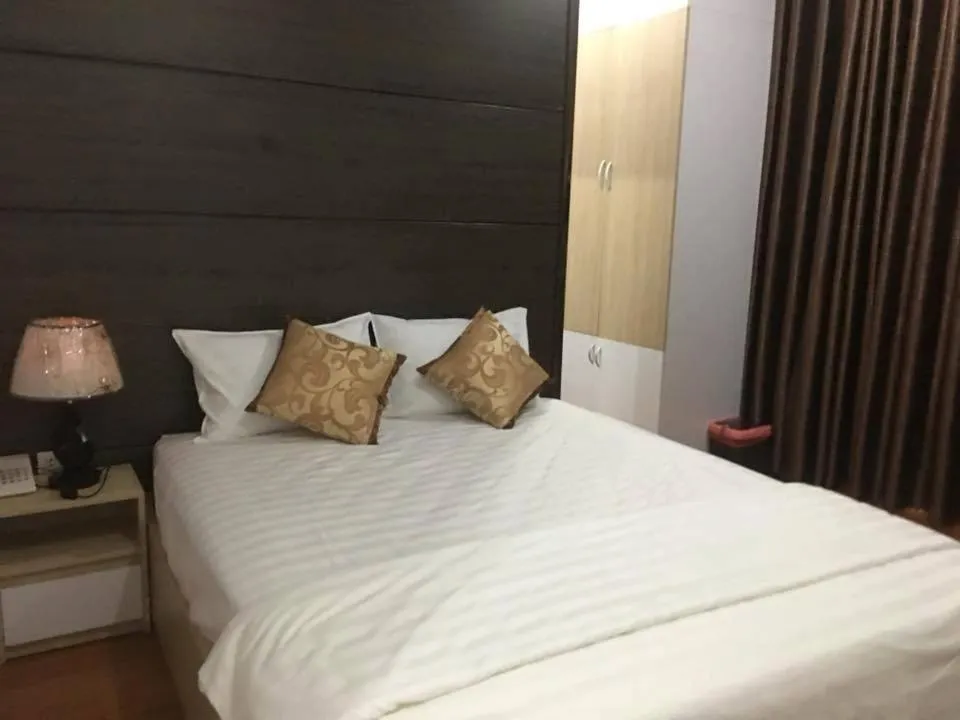 Bed in Phi Long Hotel
