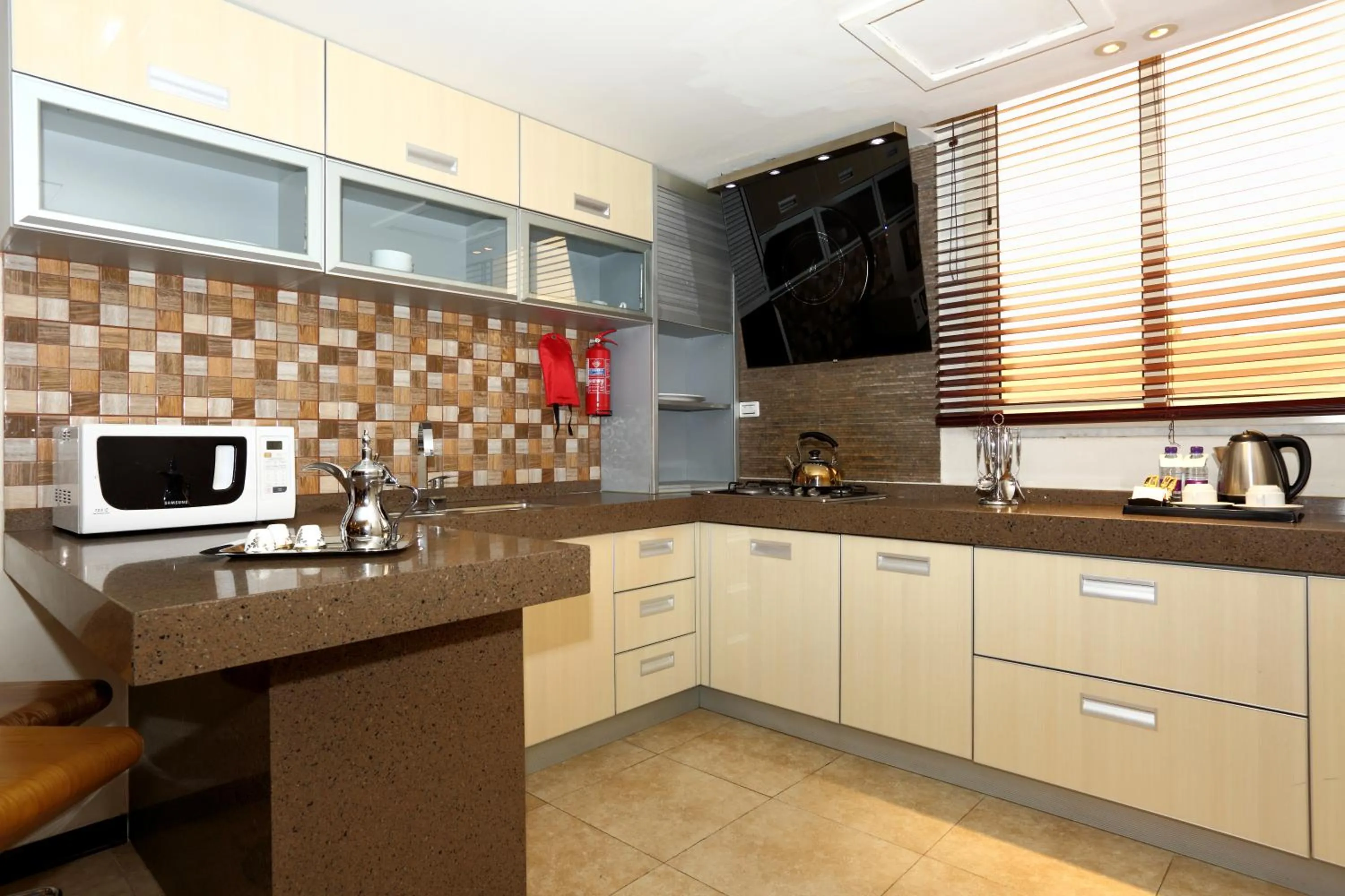 Kitchen or kitchenette in Boudl Gardenia Resort