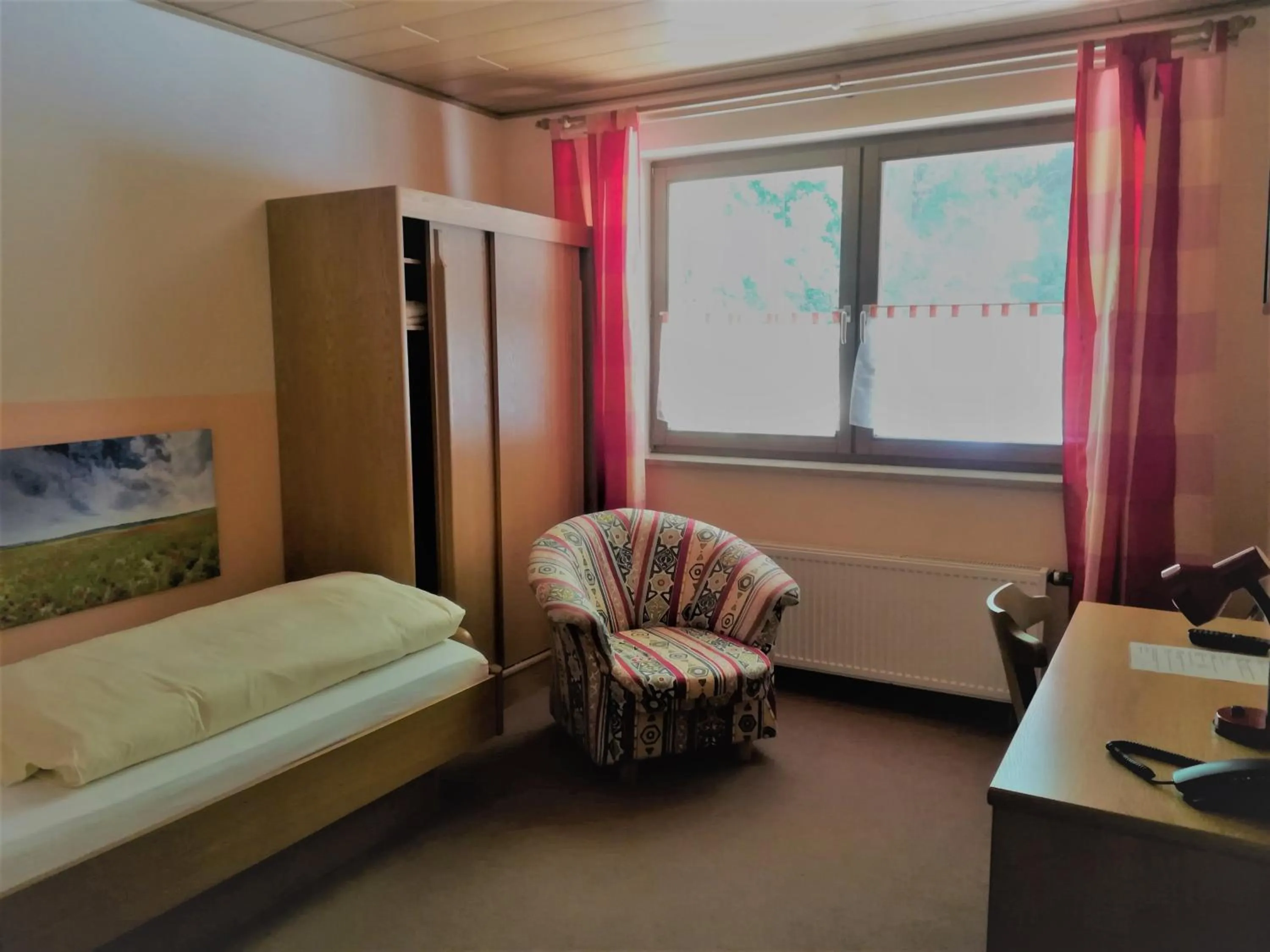 Seating area, Bed in Landgasthof Schwarz