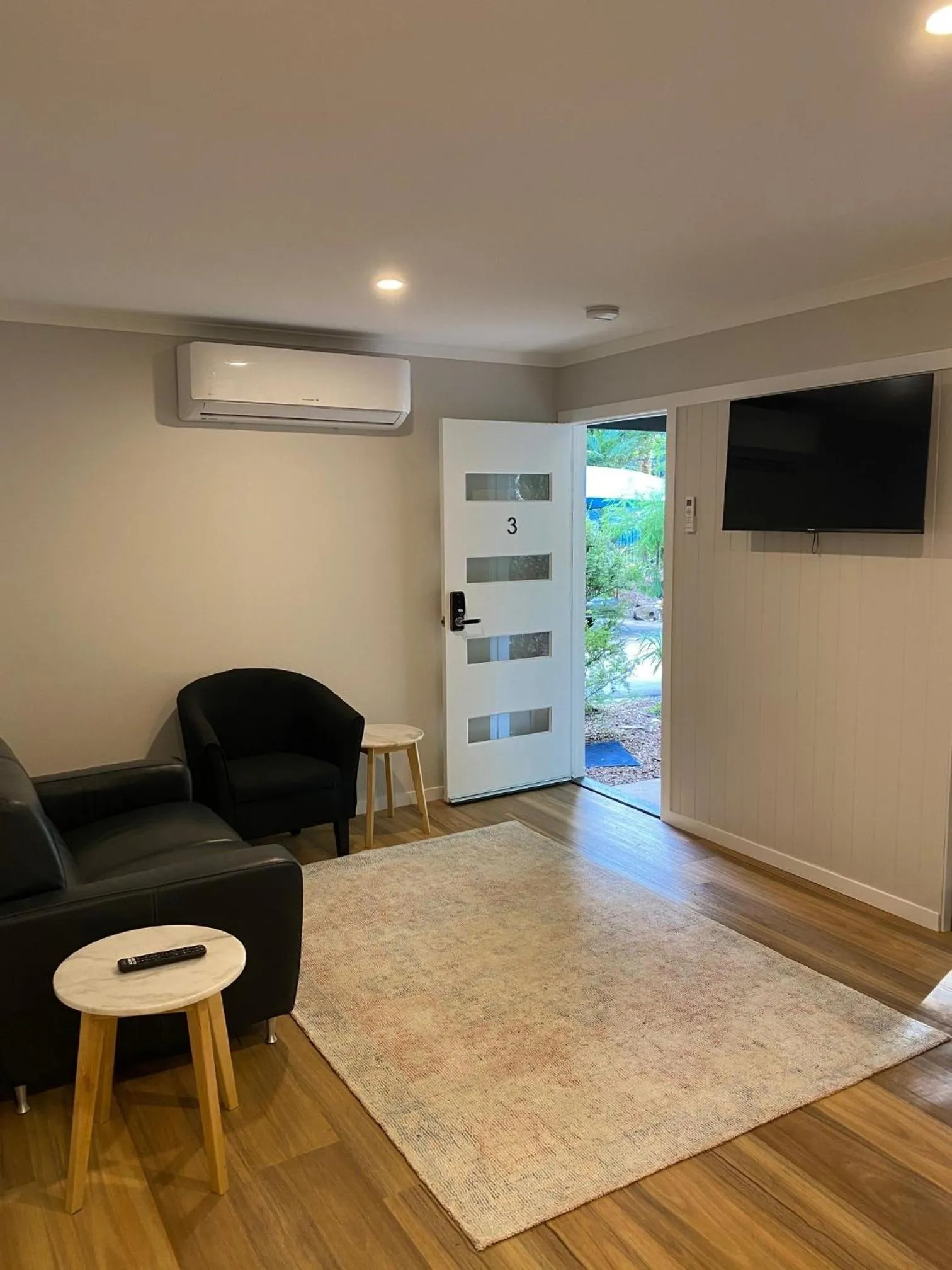 Communal lounge/ TV room in Koala Cabins Sunshine Coast