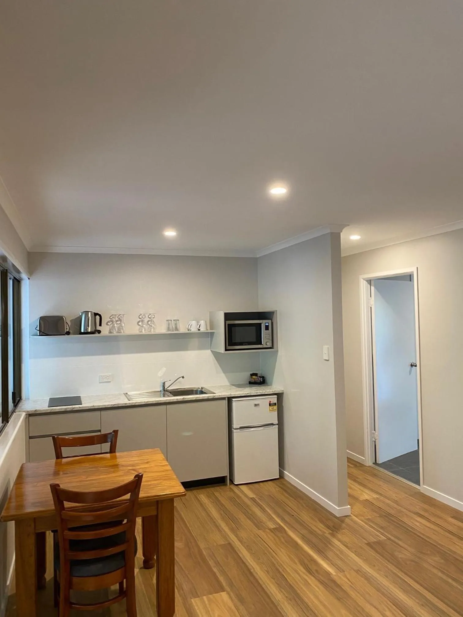 Kitchen or kitchenette in Koala Cabins Sunshine Coast