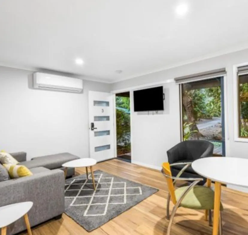 Communal lounge/ TV room in Koala Cabins Sunshine Coast