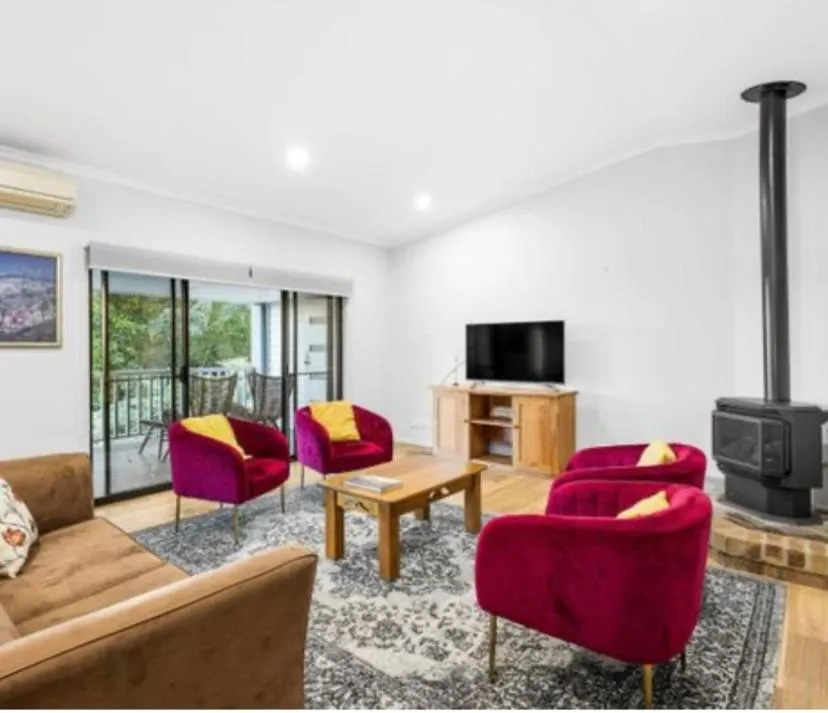 Communal lounge/ TV room in Koala Cabins Sunshine Coast