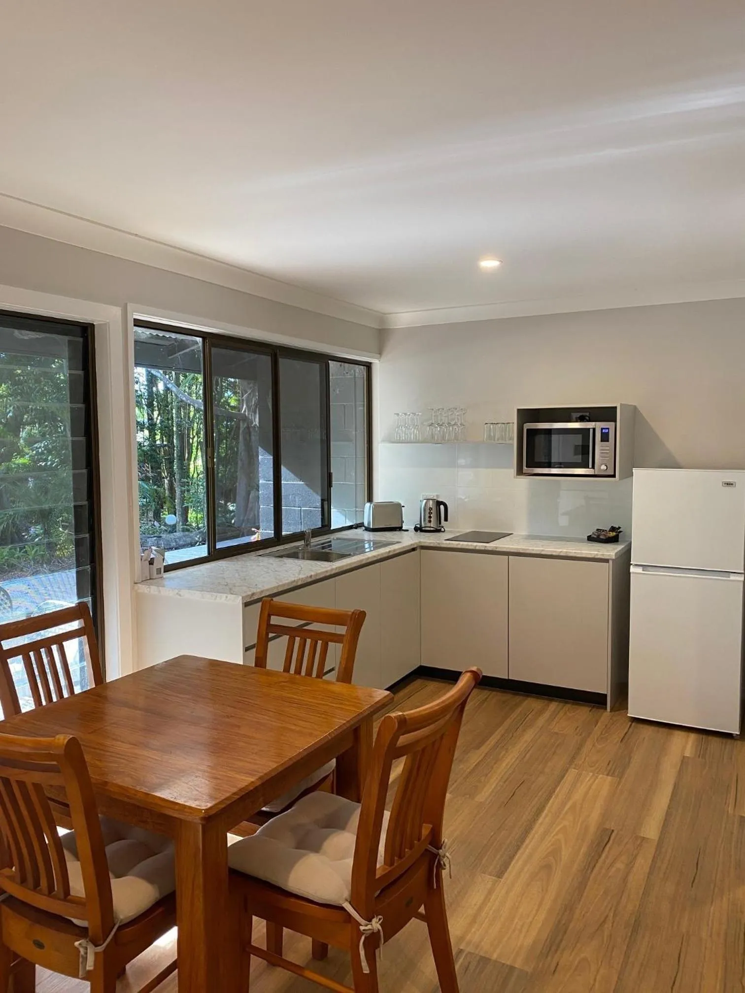 Kitchen or kitchenette in Koala Cabins Sunshine Coast