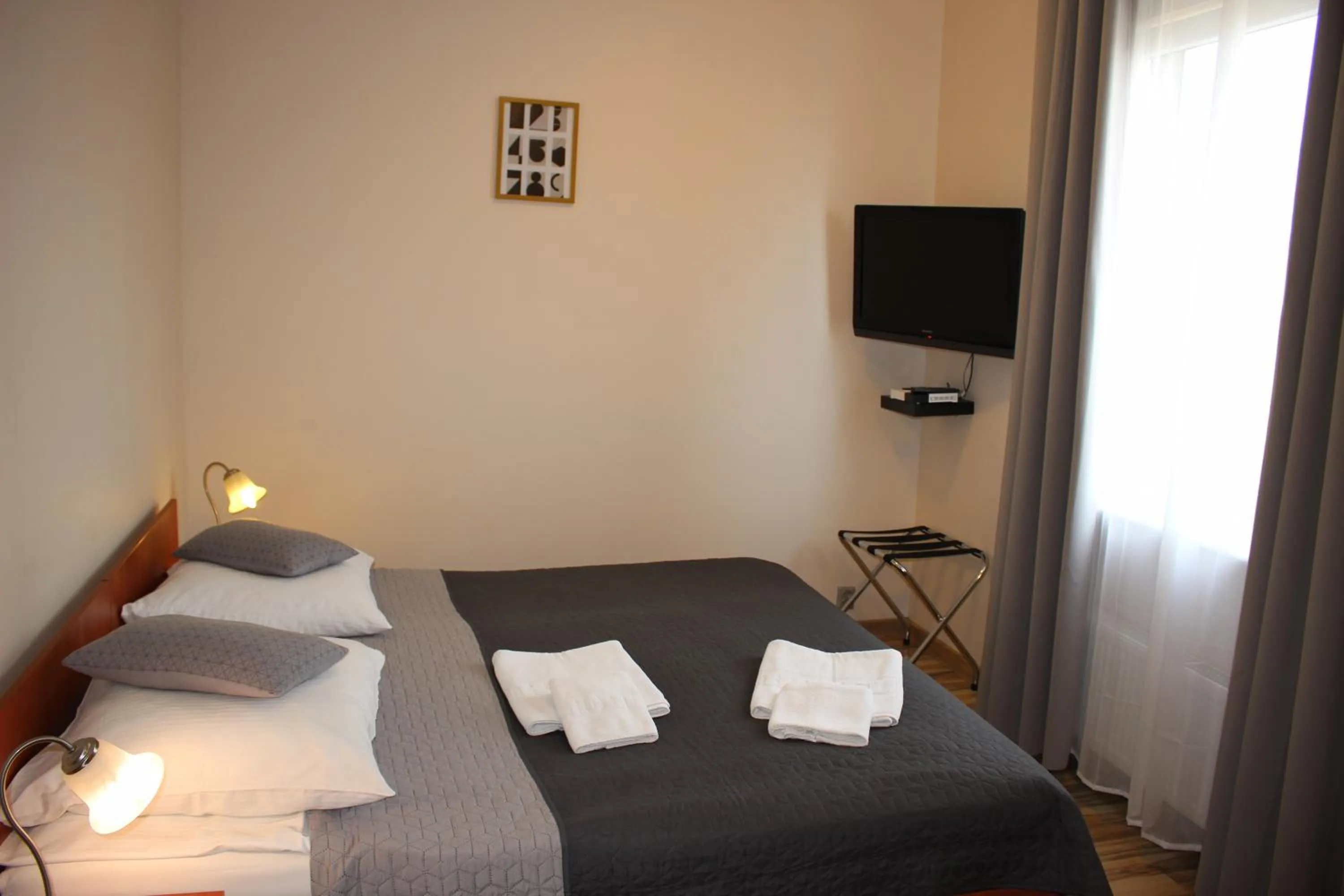 Photo of the whole room, Bed in Hotel 1