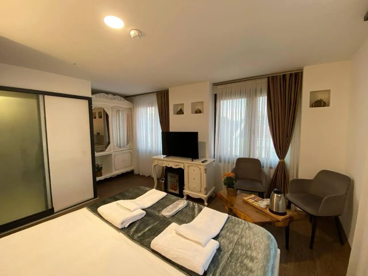 Bed in Pandora Hotel