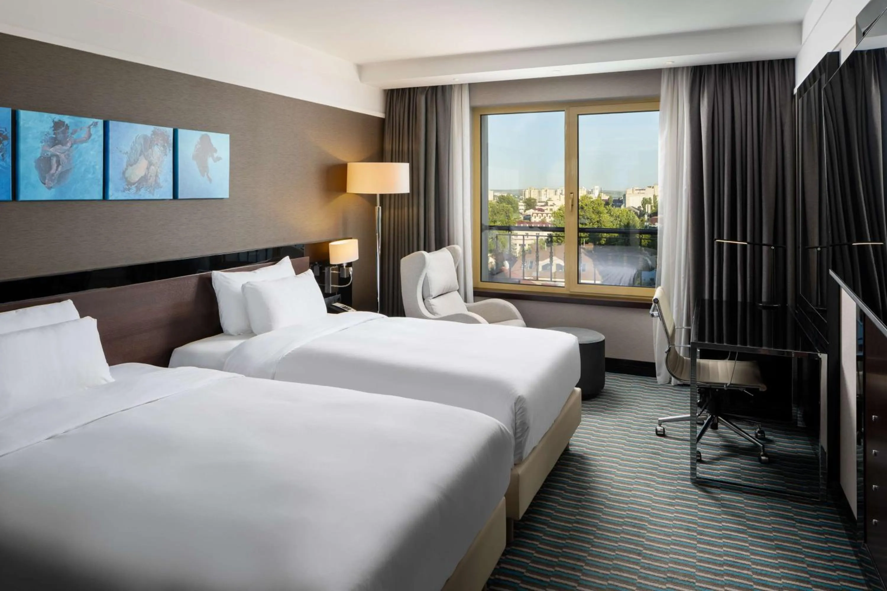 Bedroom, Bed in Radisson Blu Leogrand Hotel