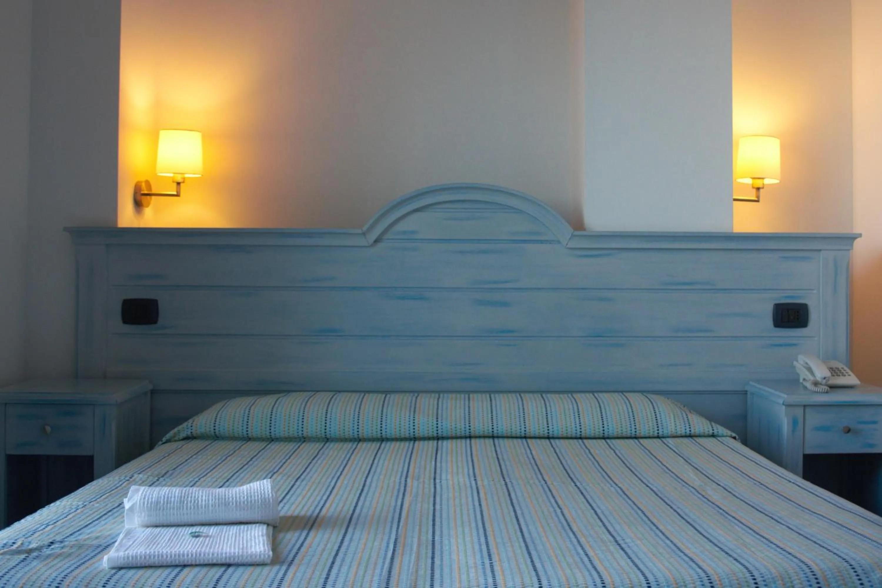 Bed in Blue Moon Hotel