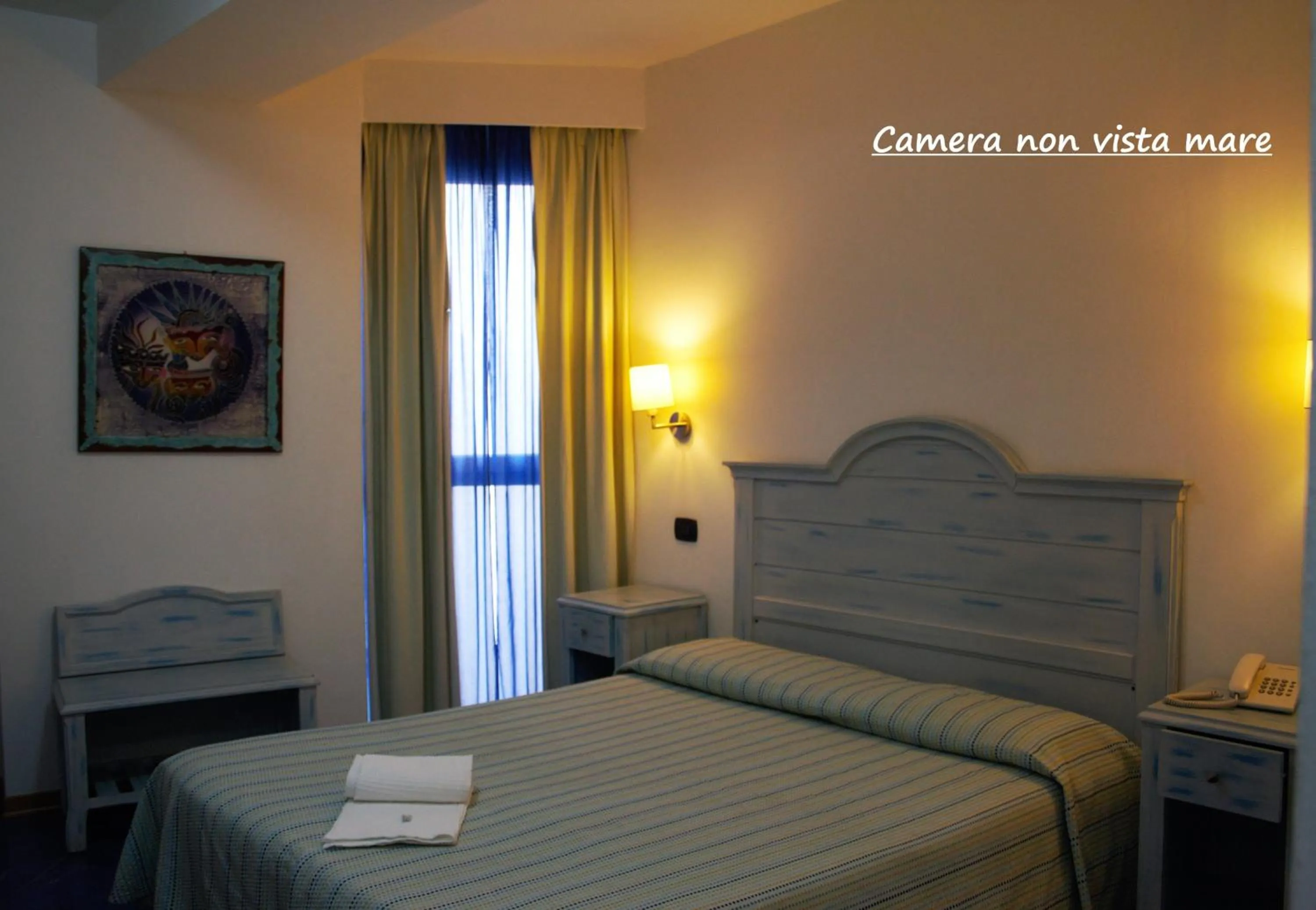 Bedroom in Blue Moon Hotel