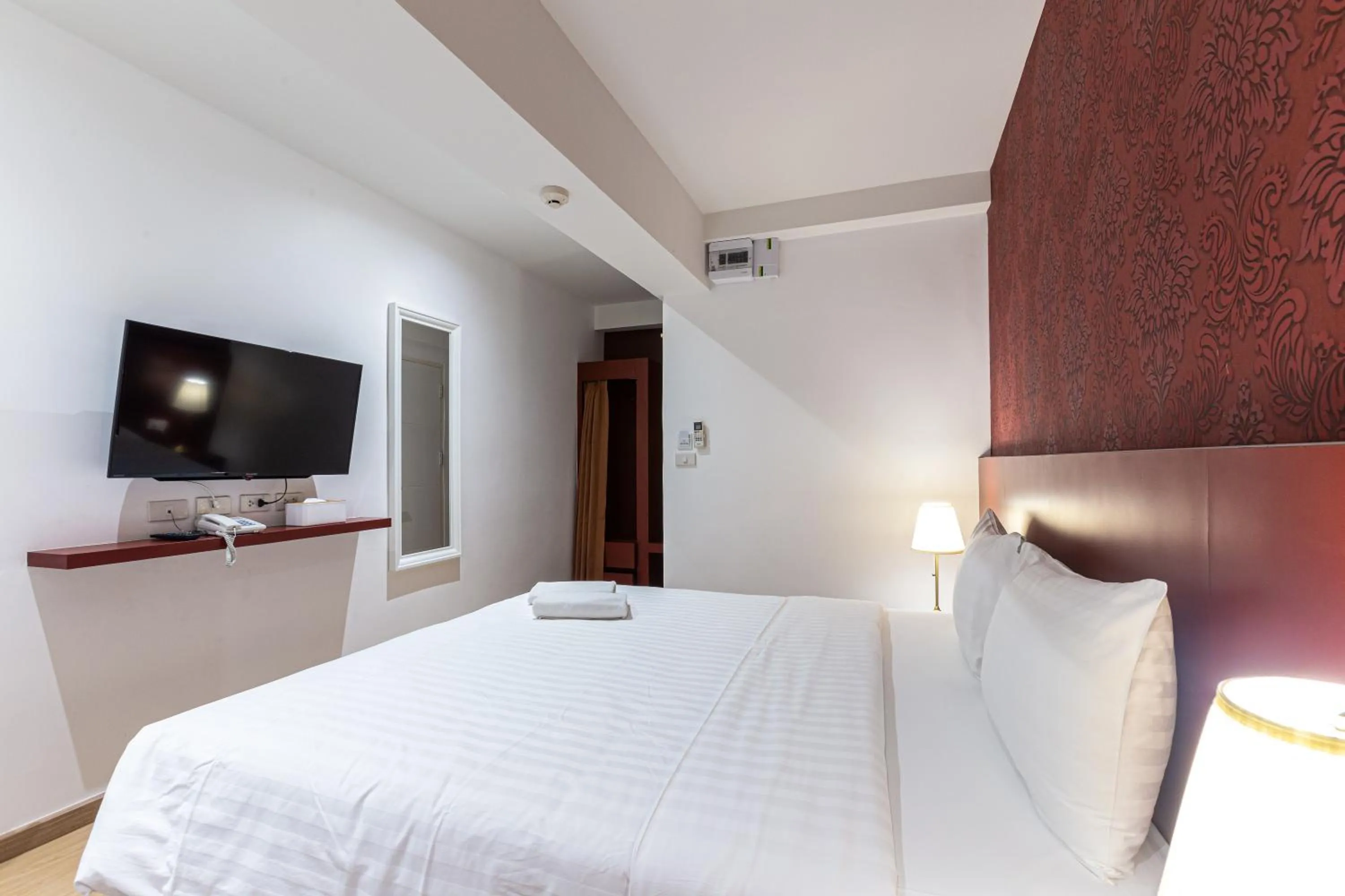 Bed in Siam Star Hotel