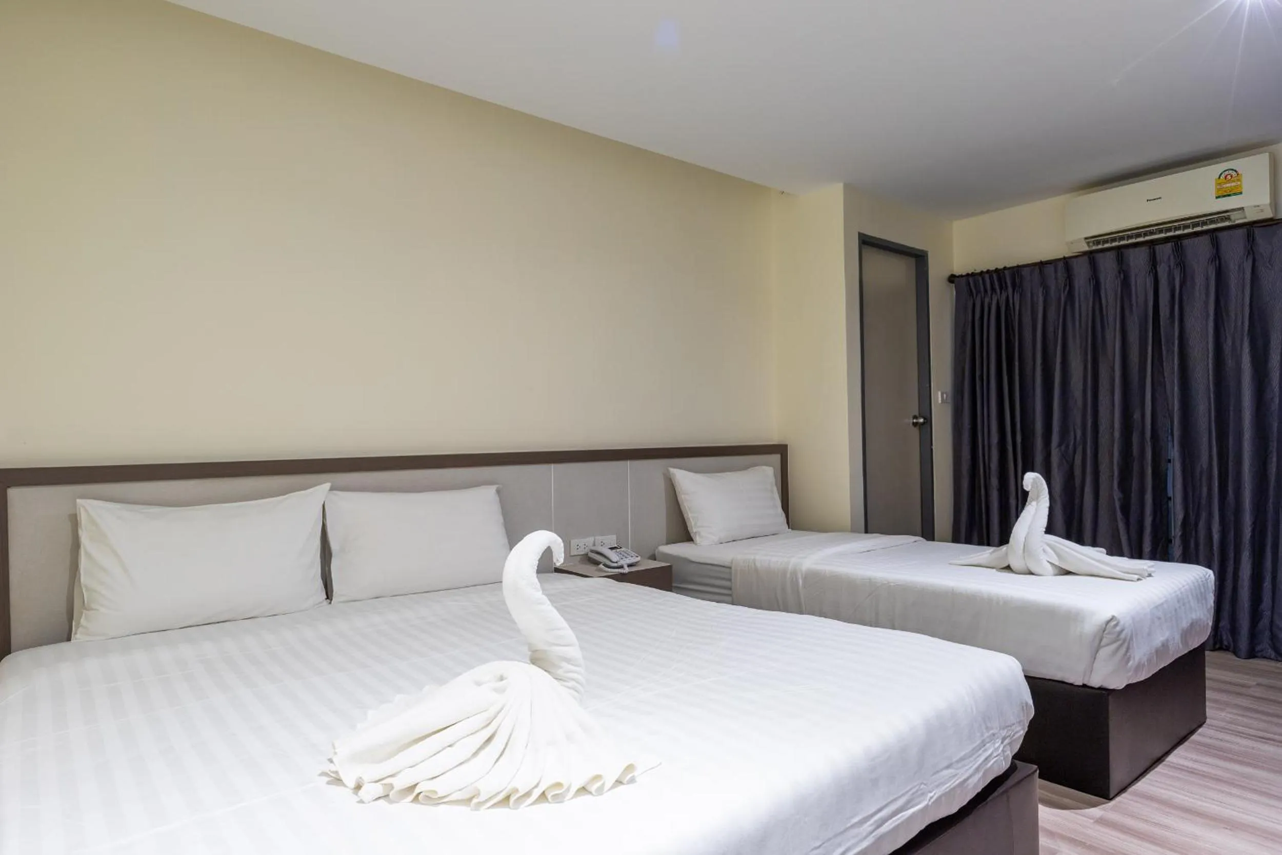 Bed in Siam Star Hotel