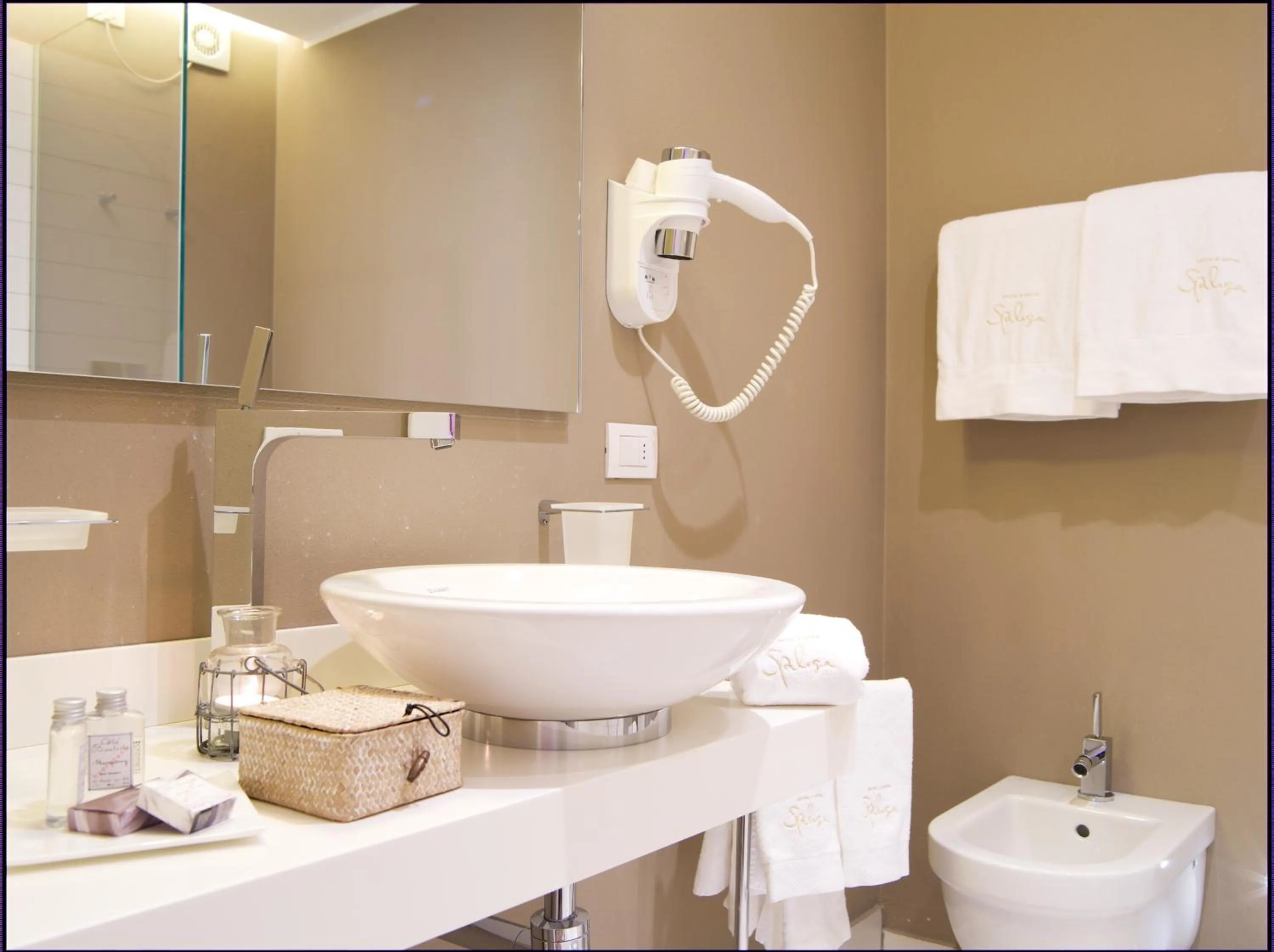 Property logo or sign in Spluga Sosta & Hotel