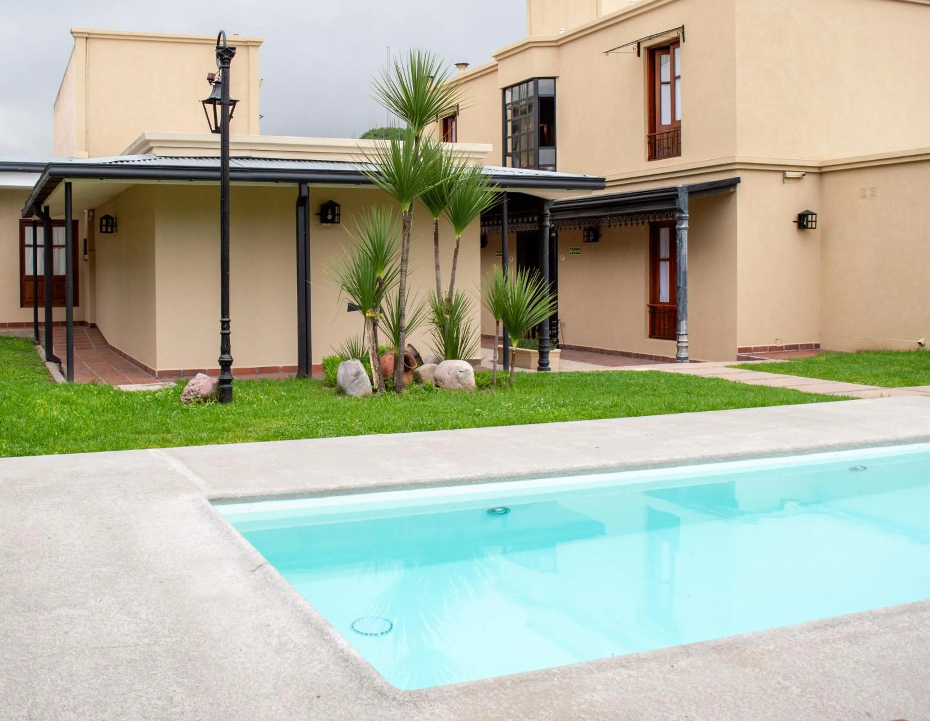 Swimming pool in El Arribo Hotel