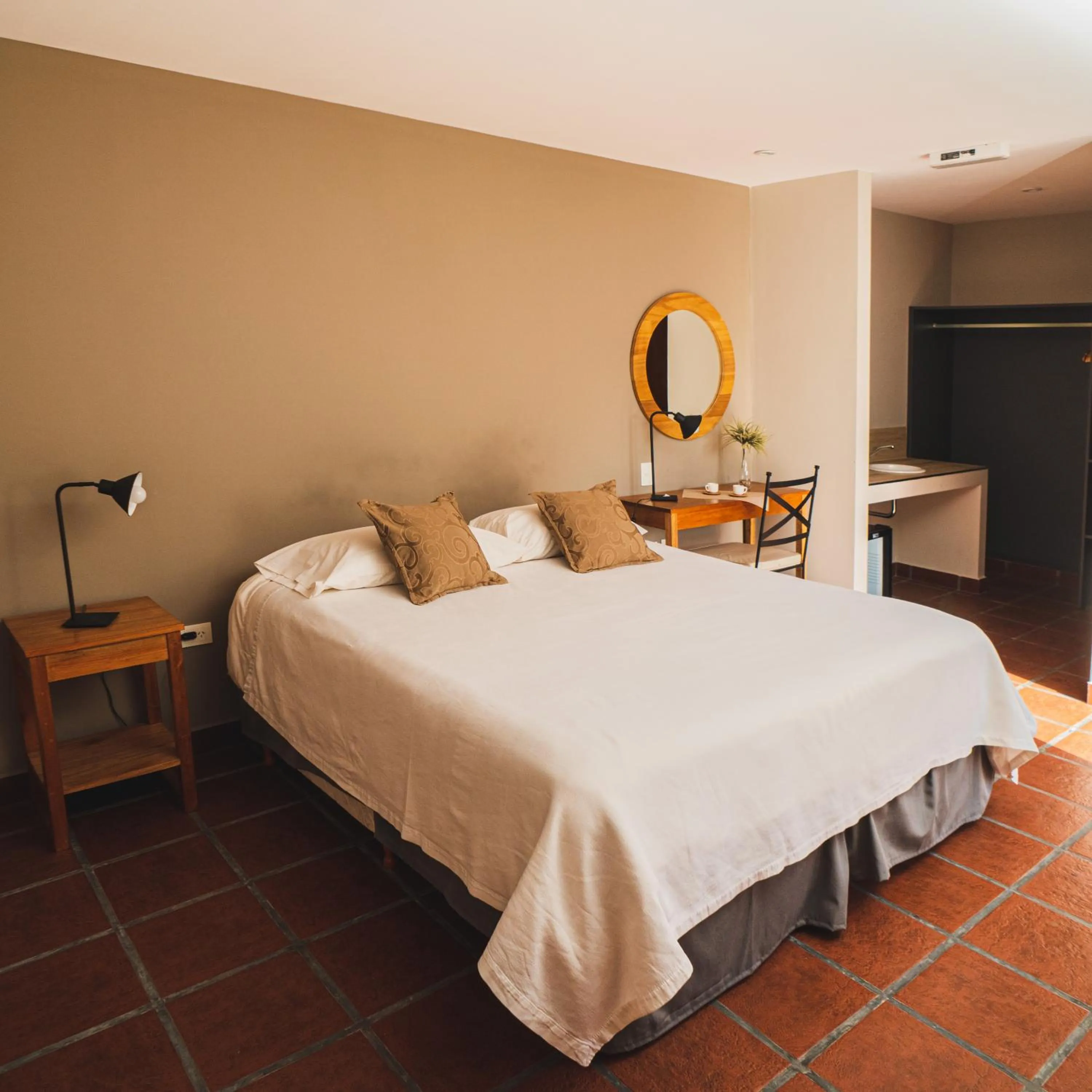Bed in El Arribo Hotel