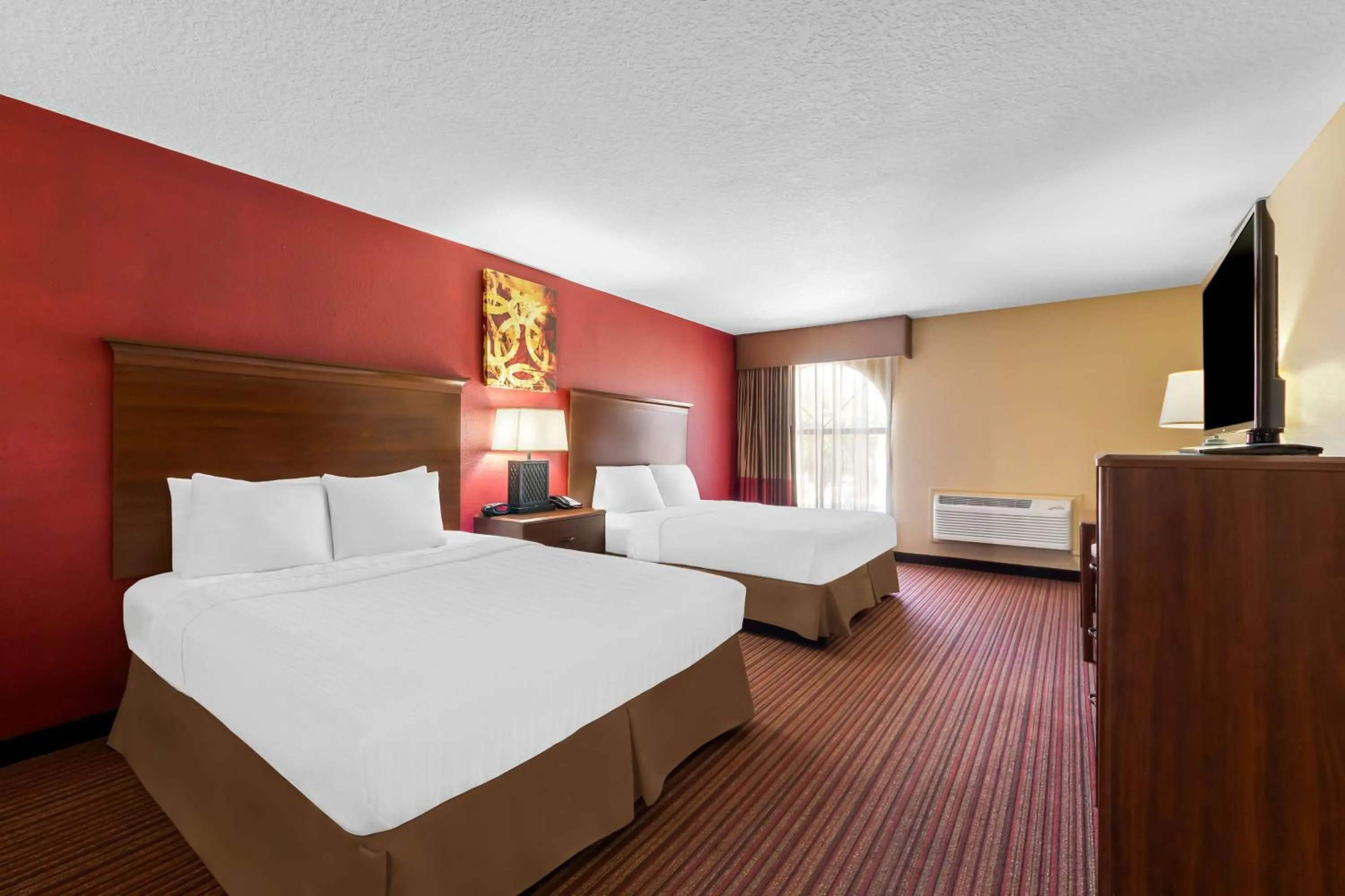 Bedroom, Bed in SureStay Plus by Best Western San Antonio Fiesta Inn