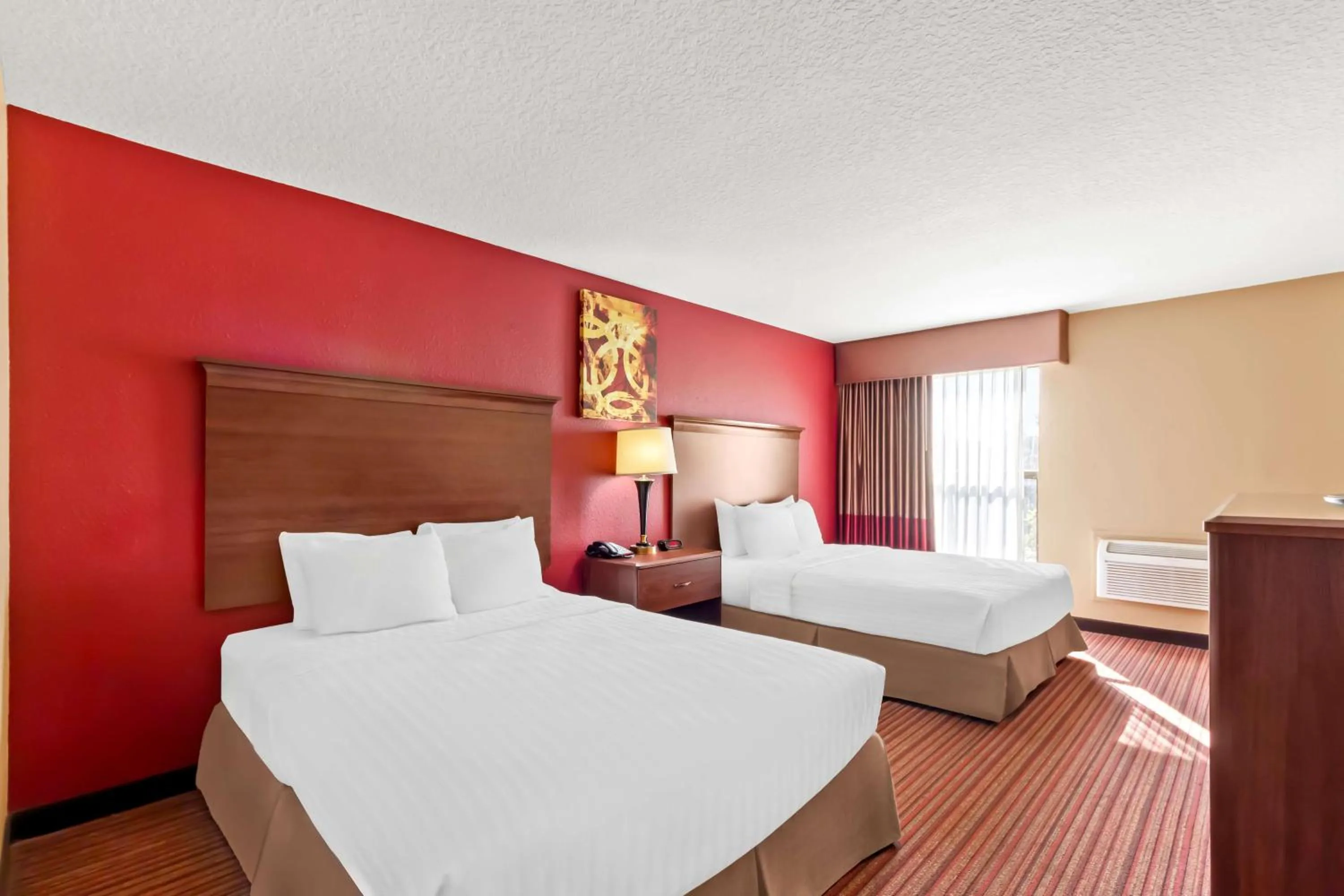 Bedroom, Bed in SureStay Plus by Best Western San Antonio Fiesta Inn