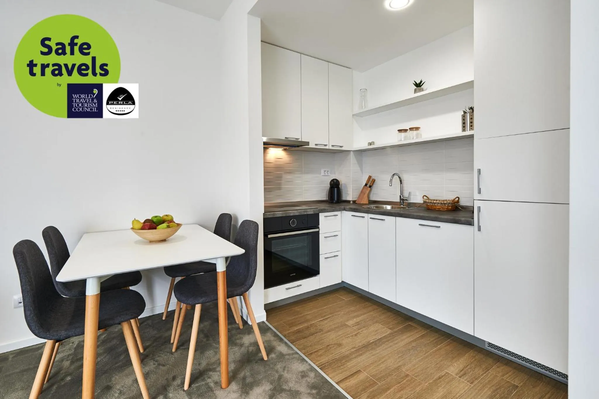 Kitchen or kitchenette in Perla Residence Hotel & SPA