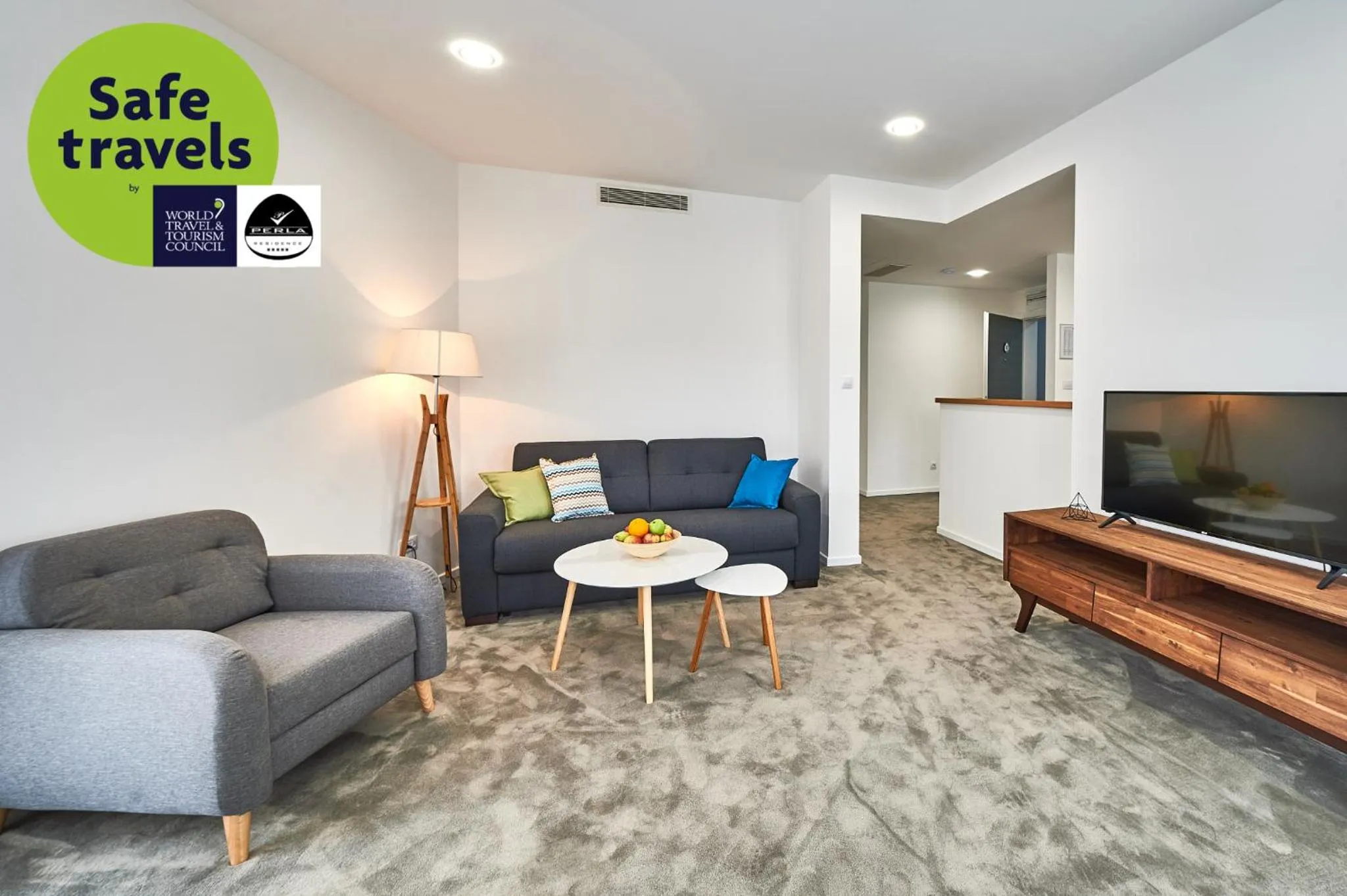 Communal lounge/ TV room in Perla Residence Hotel & SPA