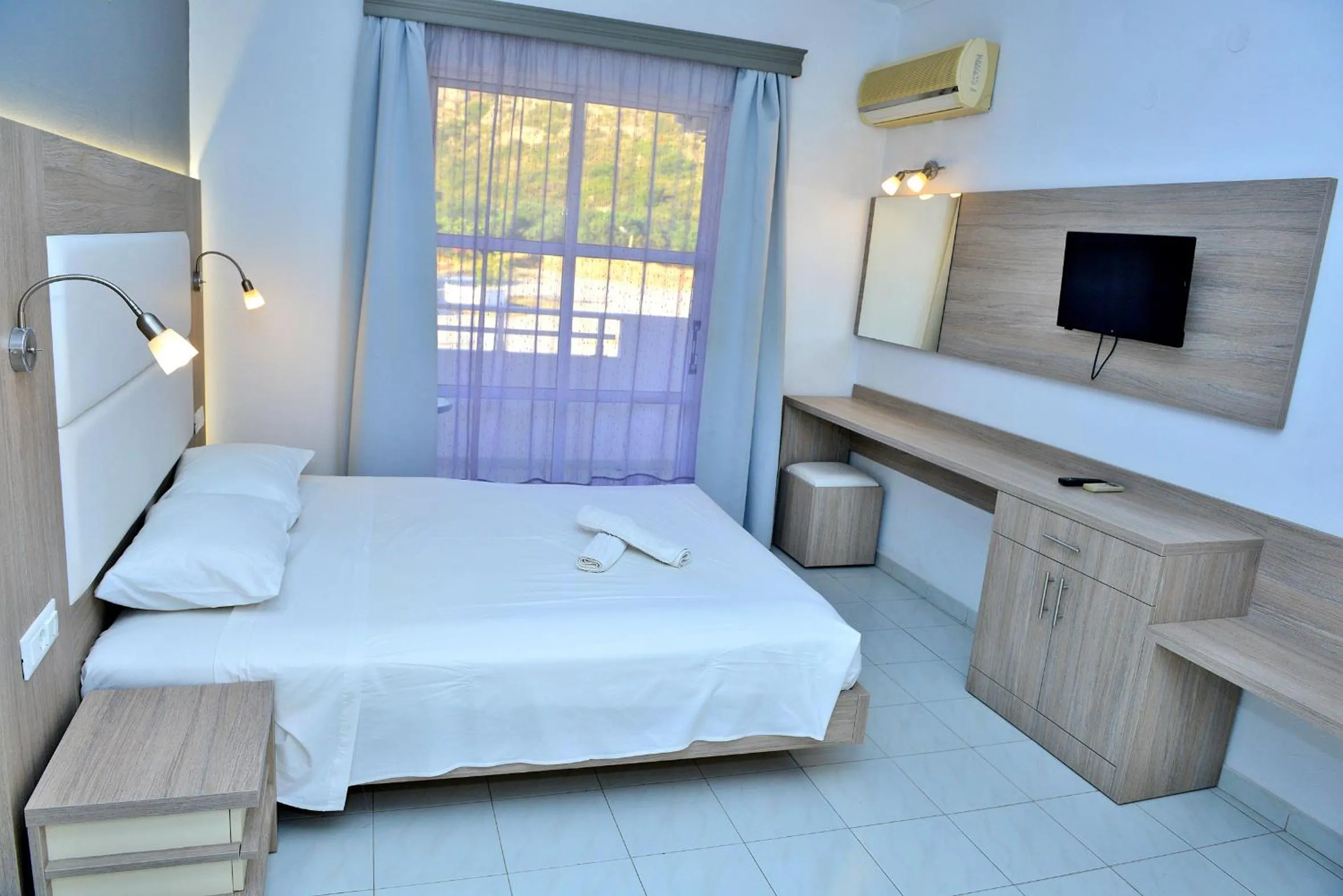 Bed in Maroula Studios