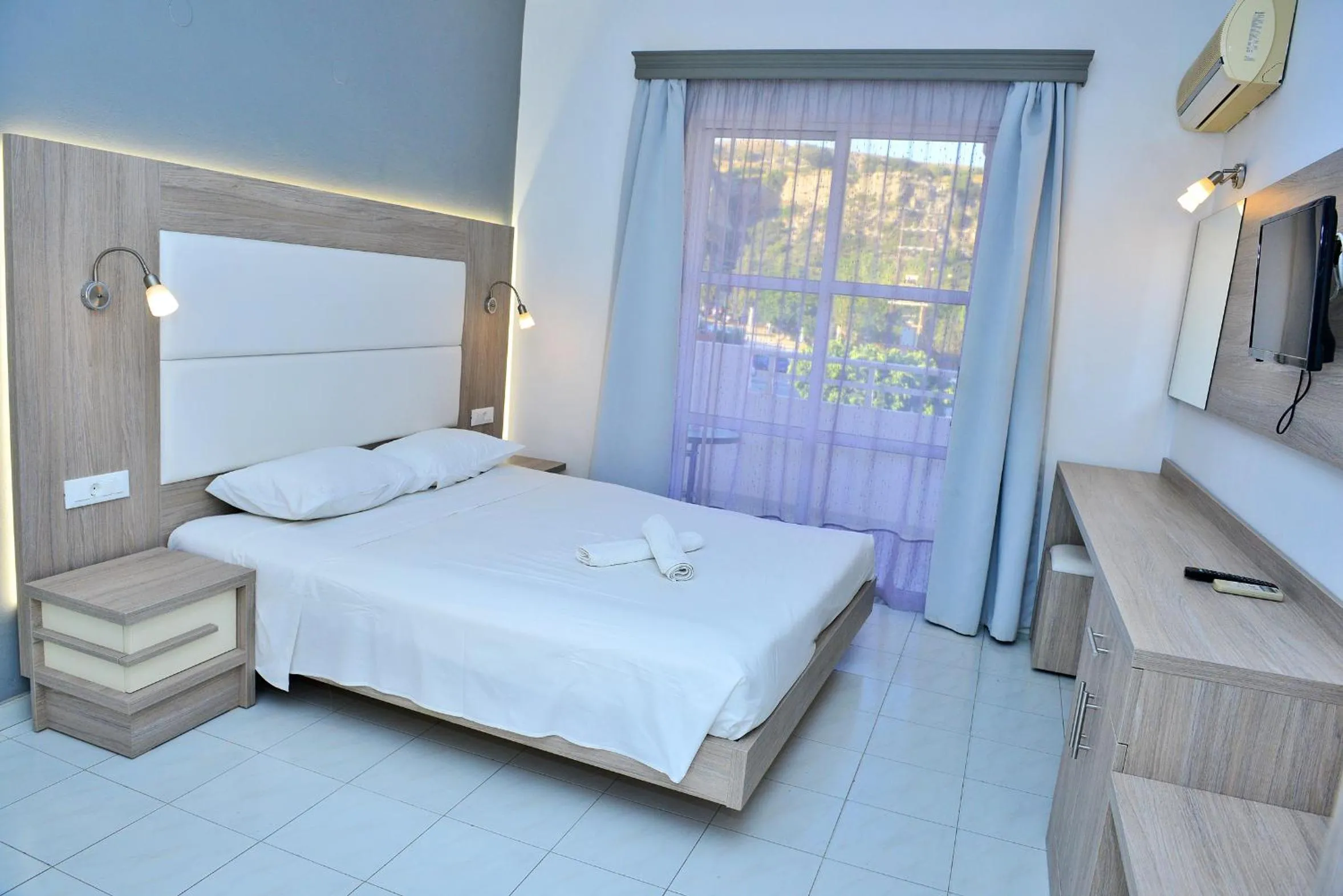 Bed in Maroula Studios