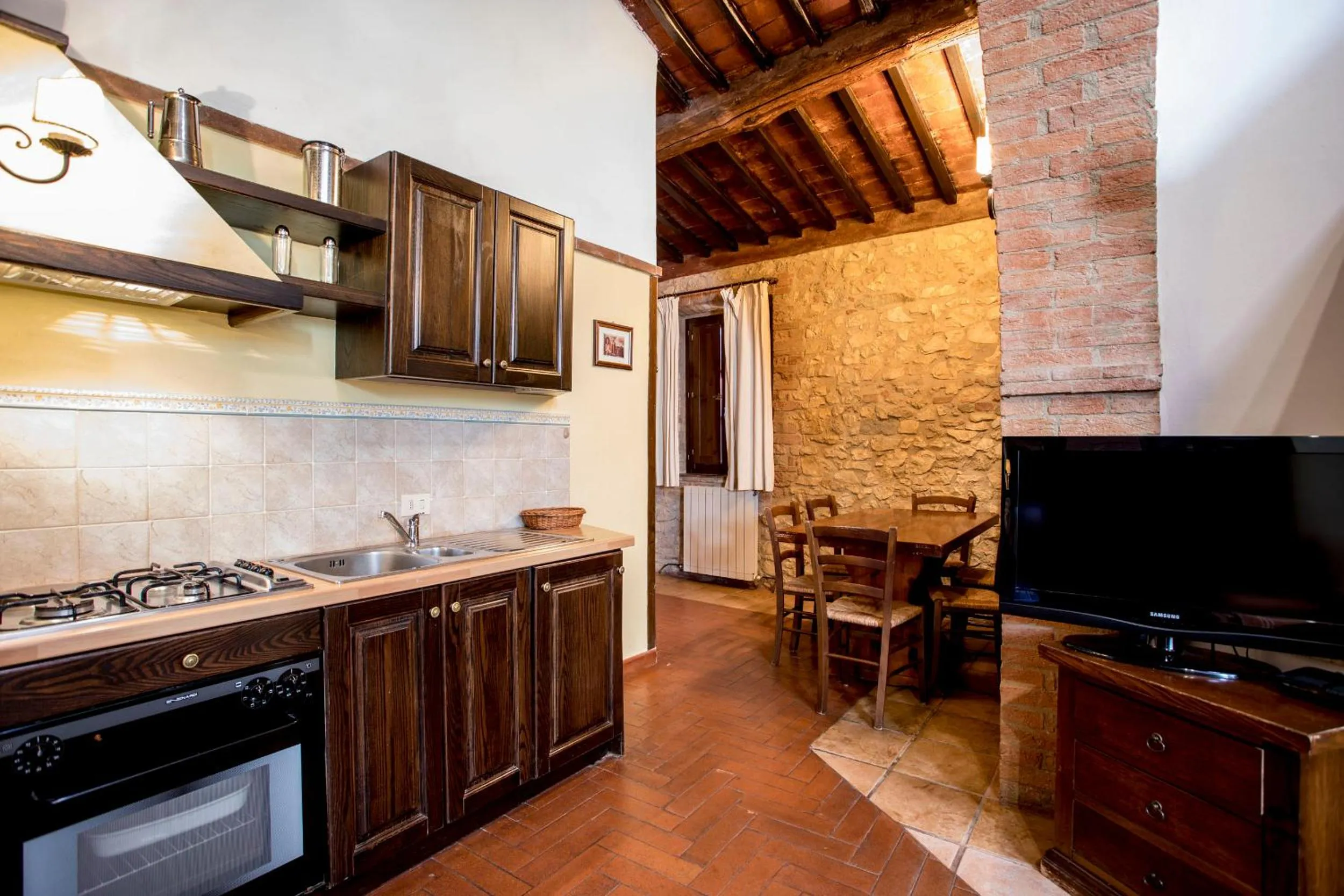 Kitchen or kitchenette in Borgo Il Poggiaccio Residenza Turistico Alberghiera