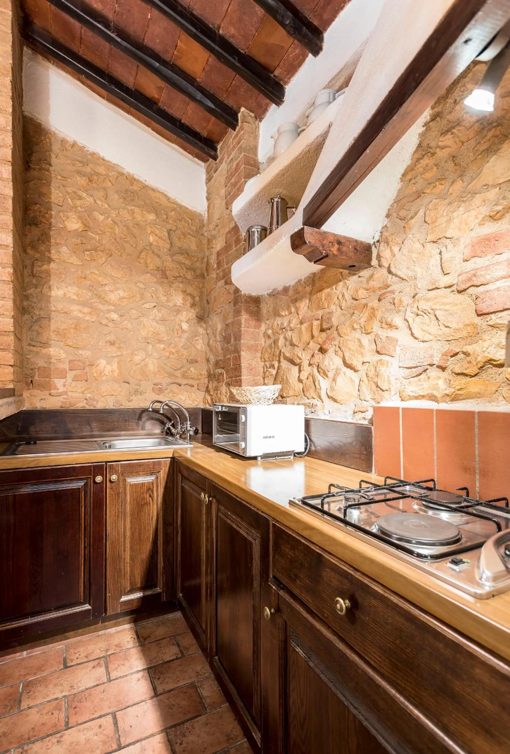 Kitchen or kitchenette in Borgo Il Poggiaccio Residenza Turistico Alberghiera