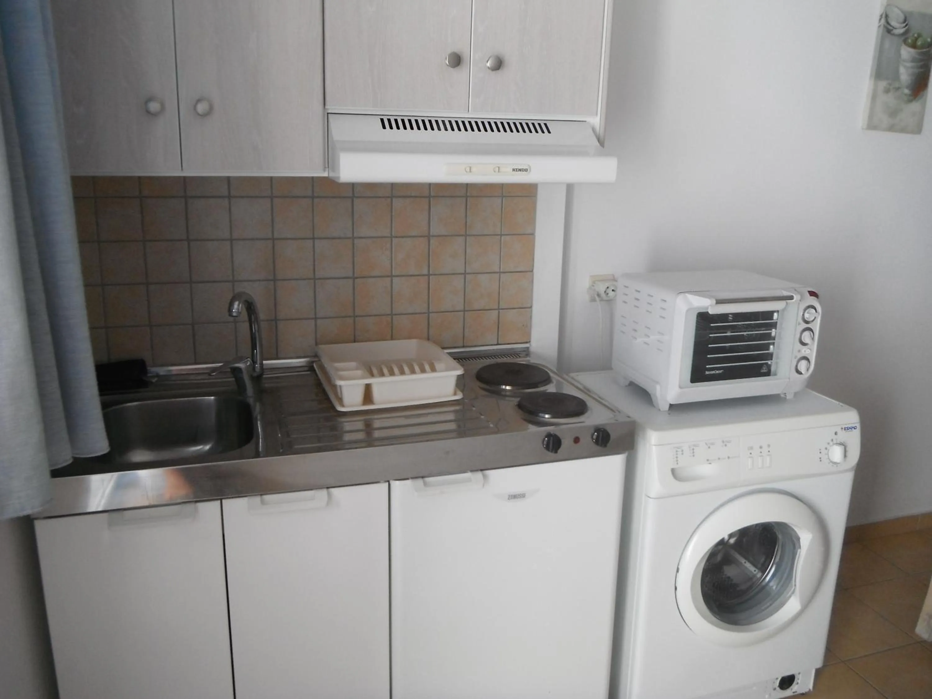 Kitchen or kitchenette in Mandorla Apartments