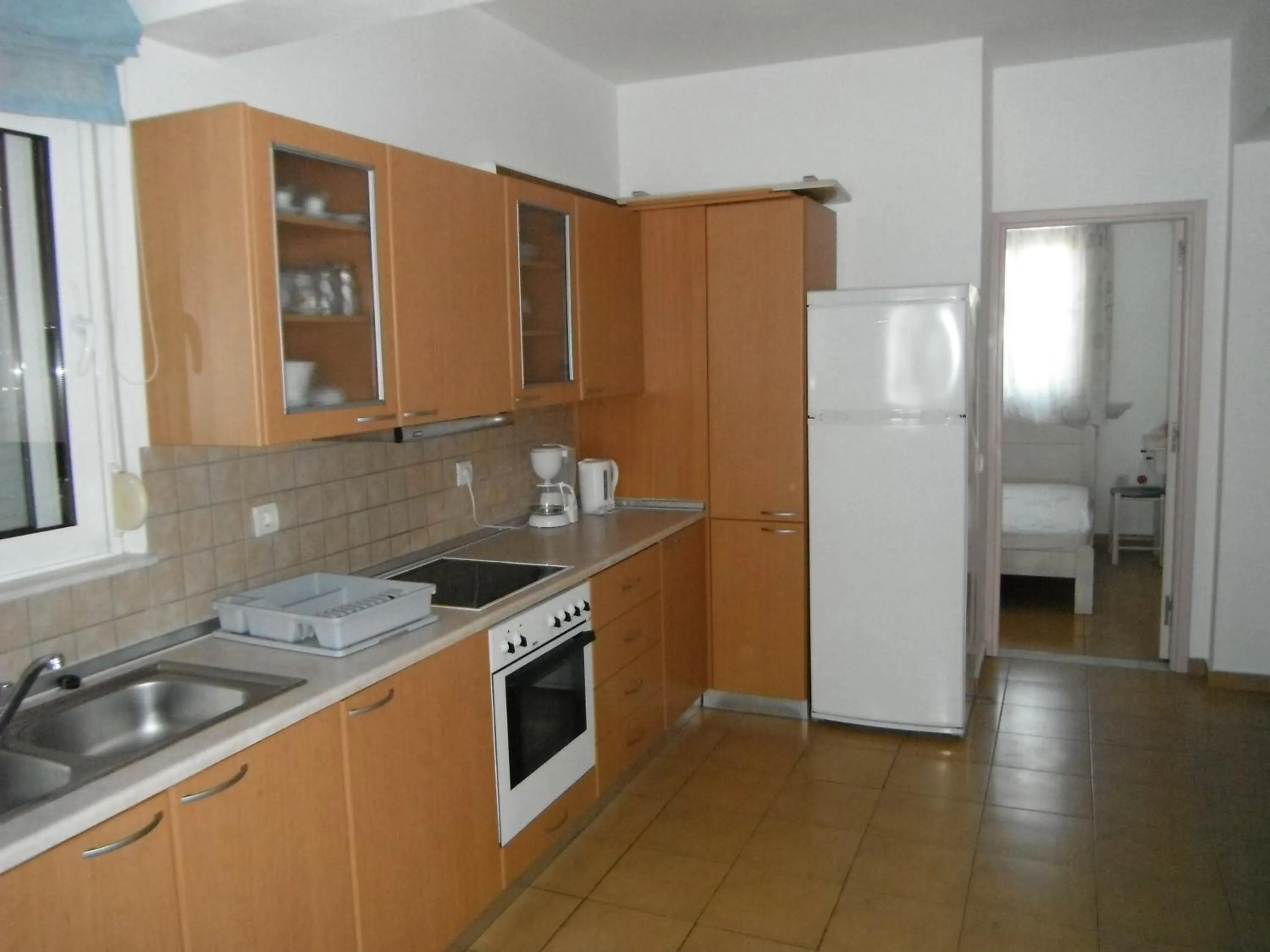 Kitchen or kitchenette in Mandorla Apartments