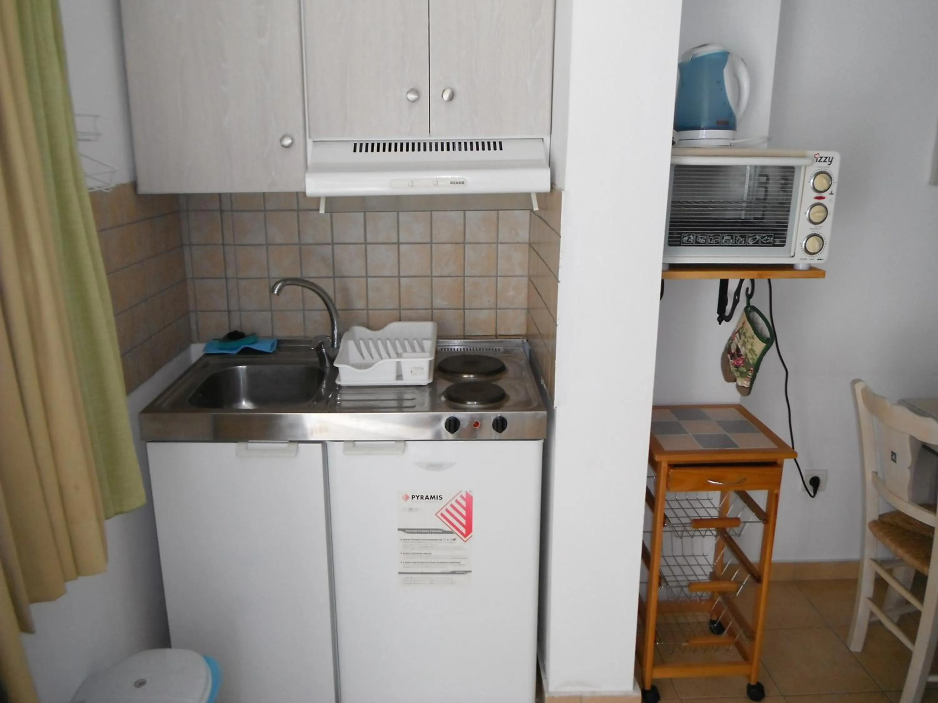 Kitchen or kitchenette in Mandorla Apartments