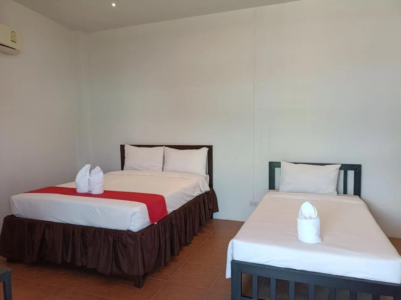 Bed in โรงแรมแอมไอม่อน - Am Amoonds Hotel