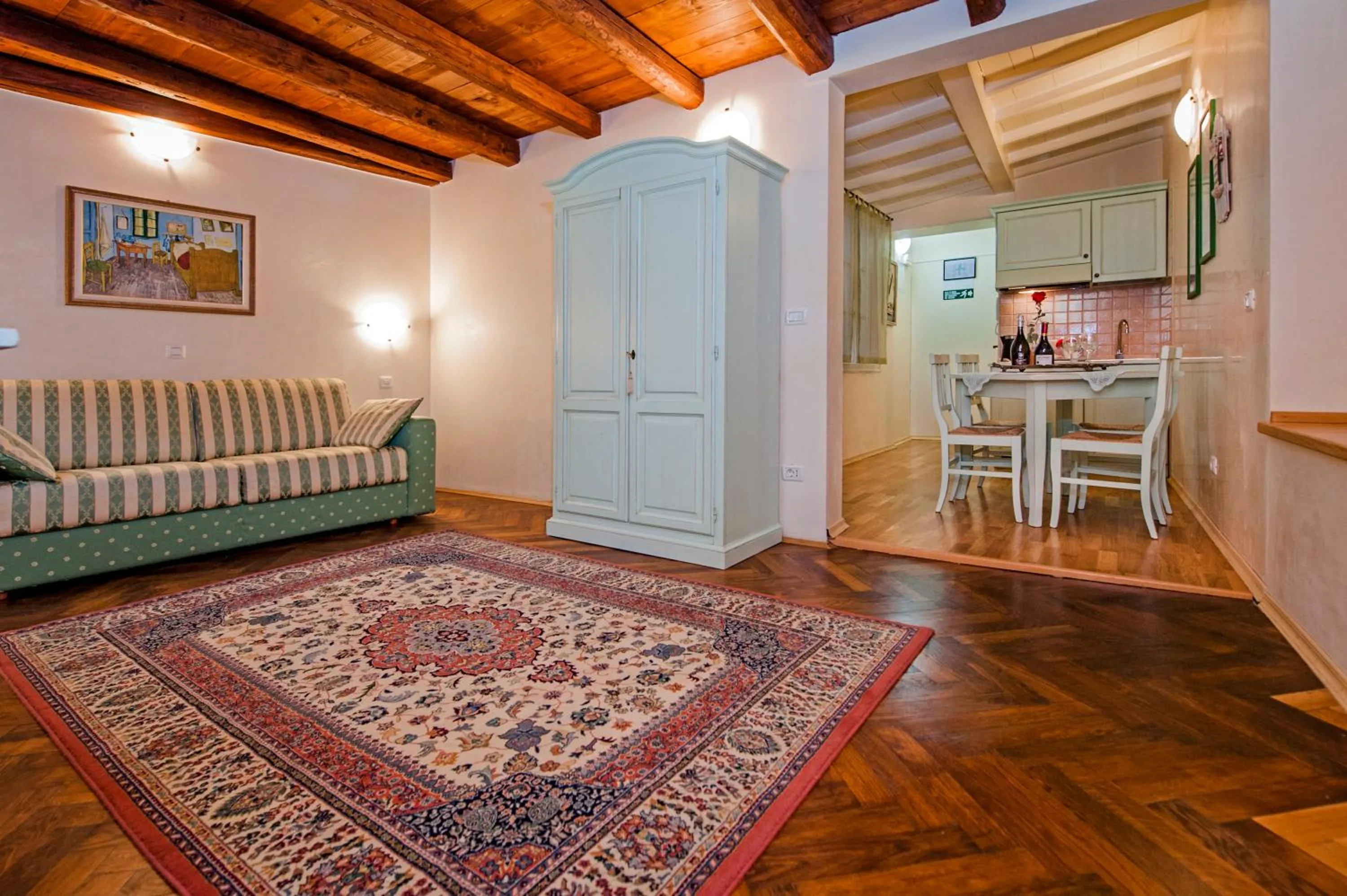 Photo of the whole room in Residence LA CARERA Centro Storico