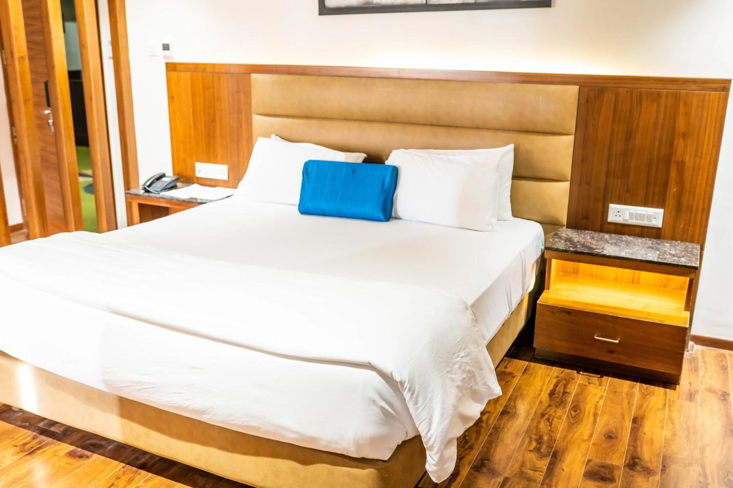 Bed in Kyriad Hotel Gulbarga by OTHPL
