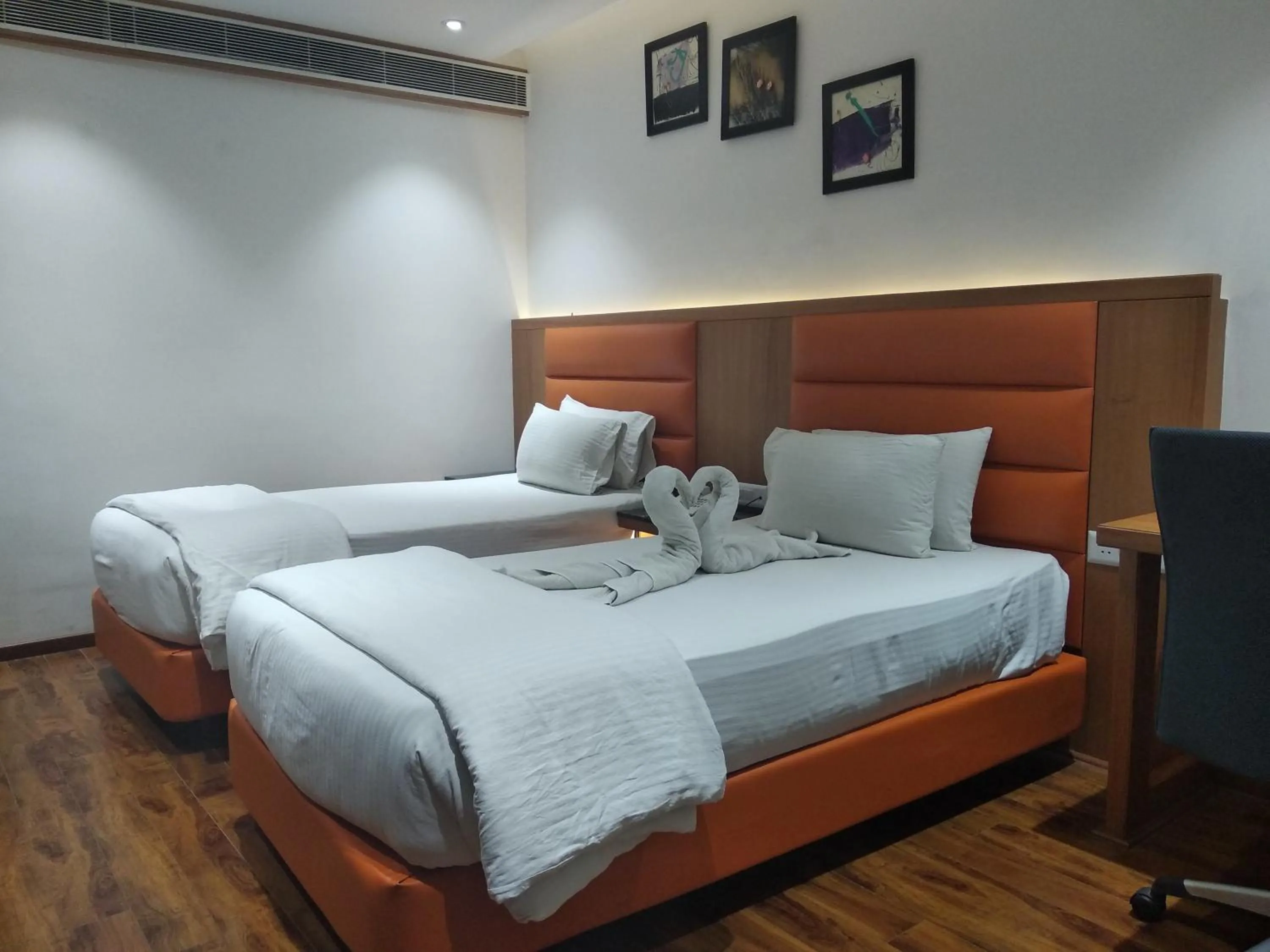 Bed in Kyriad Hotel Gulbarga by OTHPL