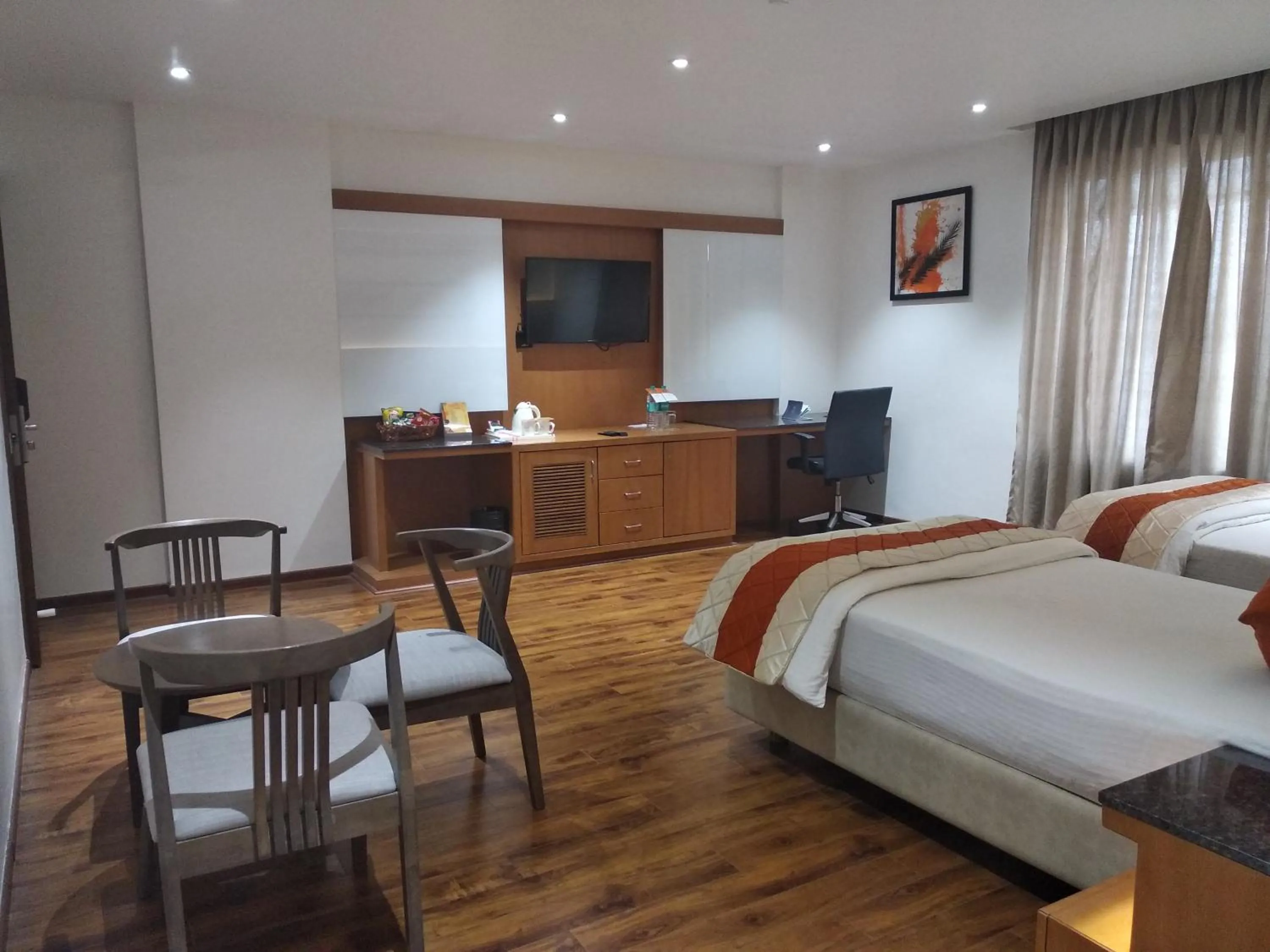 Bed in Kyriad Hotel Gulbarga by OTHPL