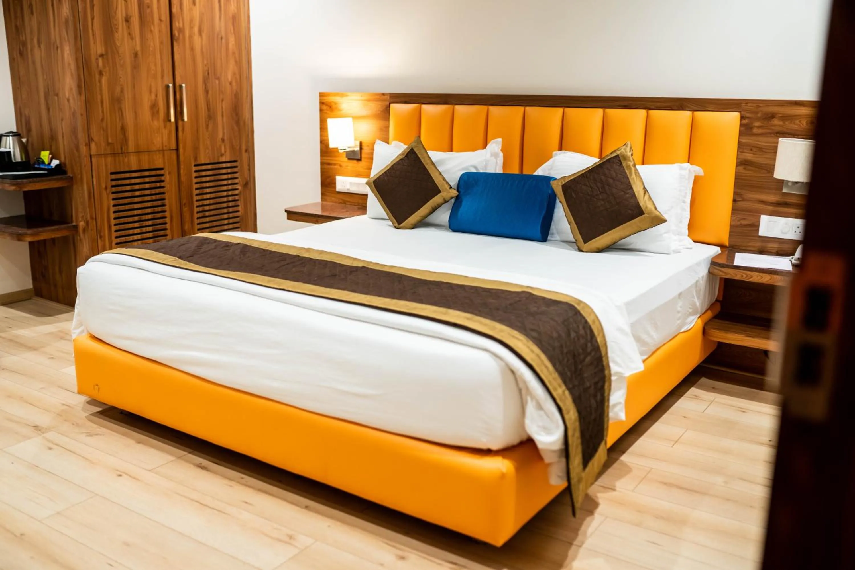Bed in Kyriad Hotel Gulbarga by OTHPL