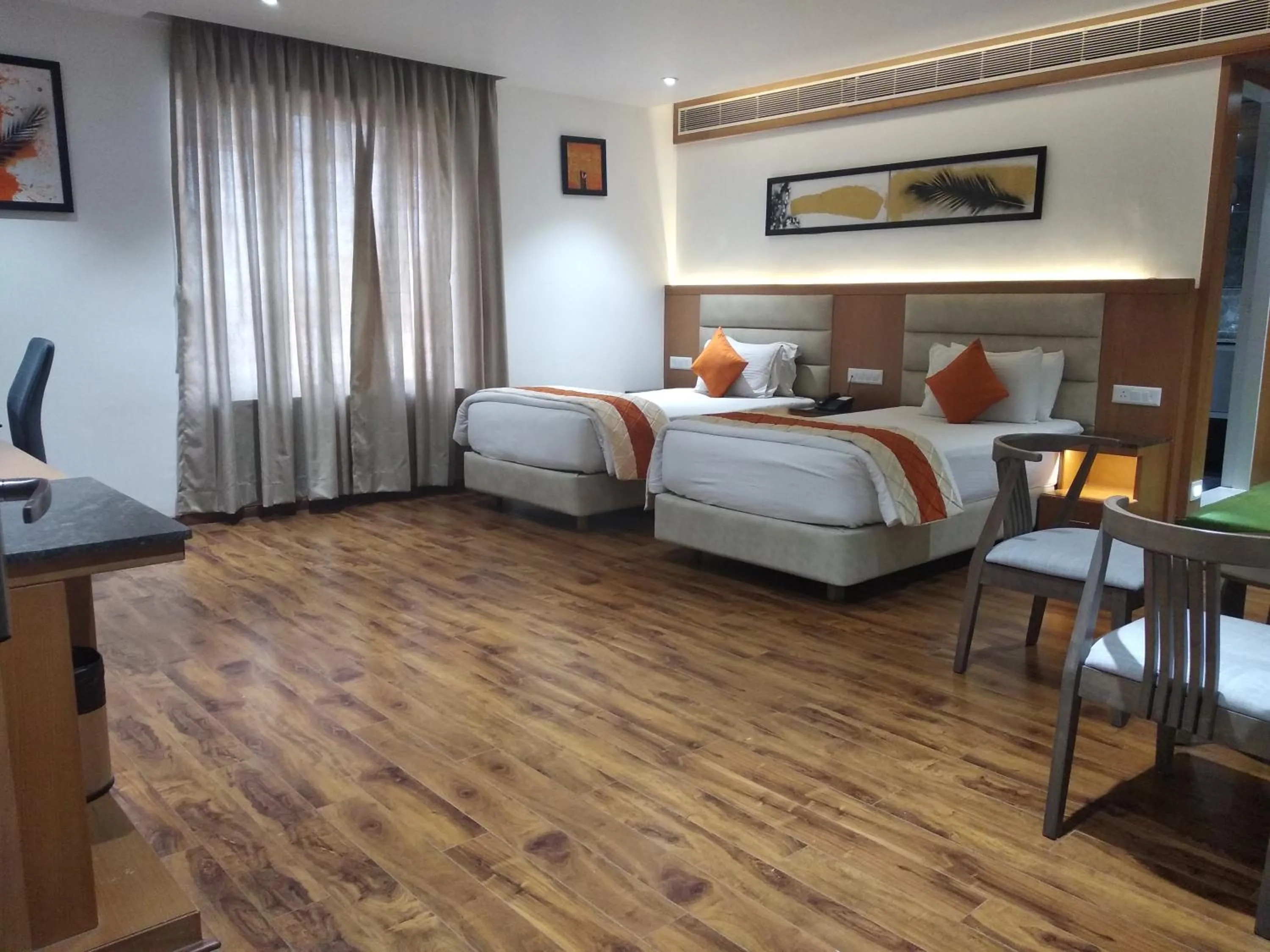 Bed in Kyriad Hotel Gulbarga by OTHPL