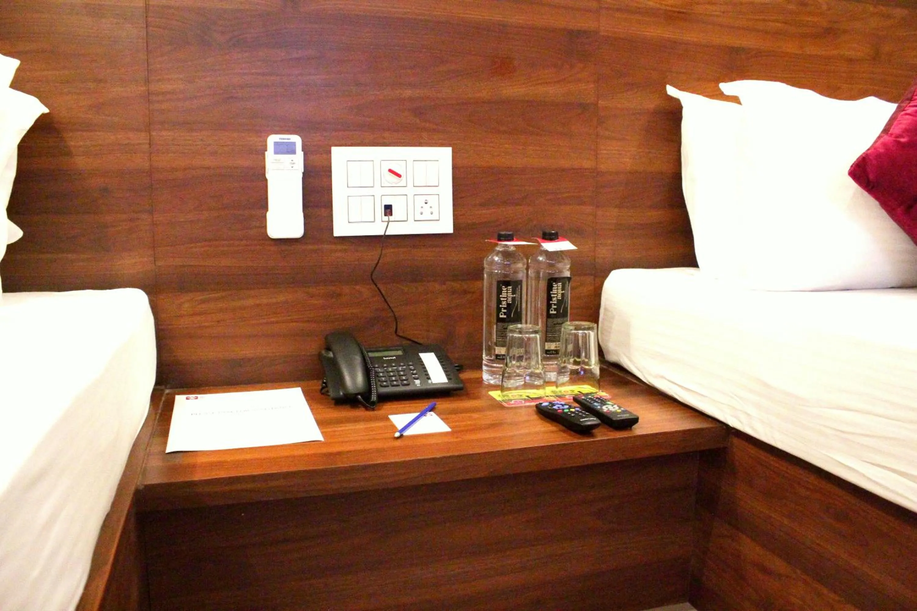 Bed in Kyriad Hotel Gulbarga by OTHPL