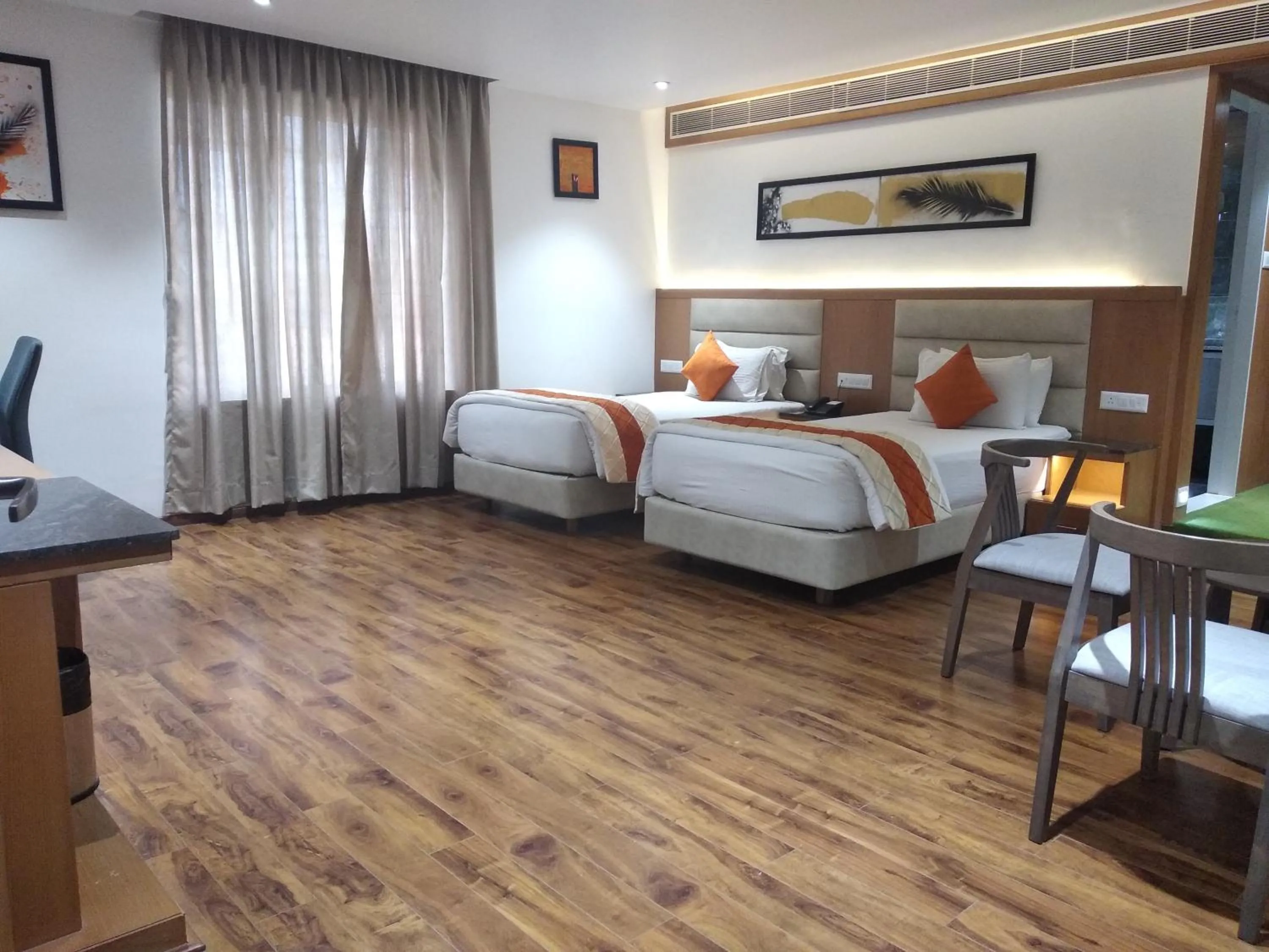Bed in Kyriad Hotel Gulbarga by OTHPL