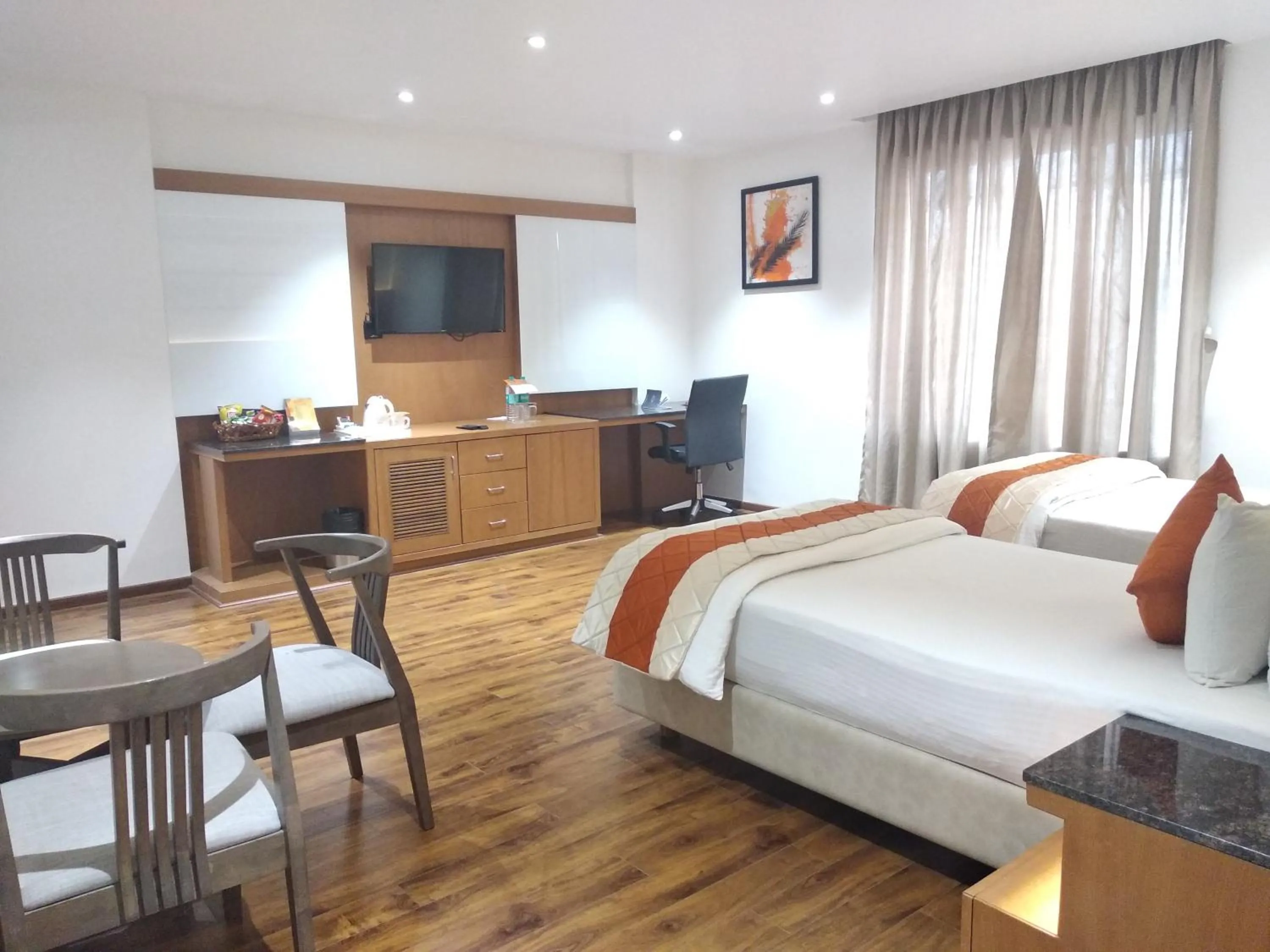 Bed in Kyriad Hotel Gulbarga by OTHPL