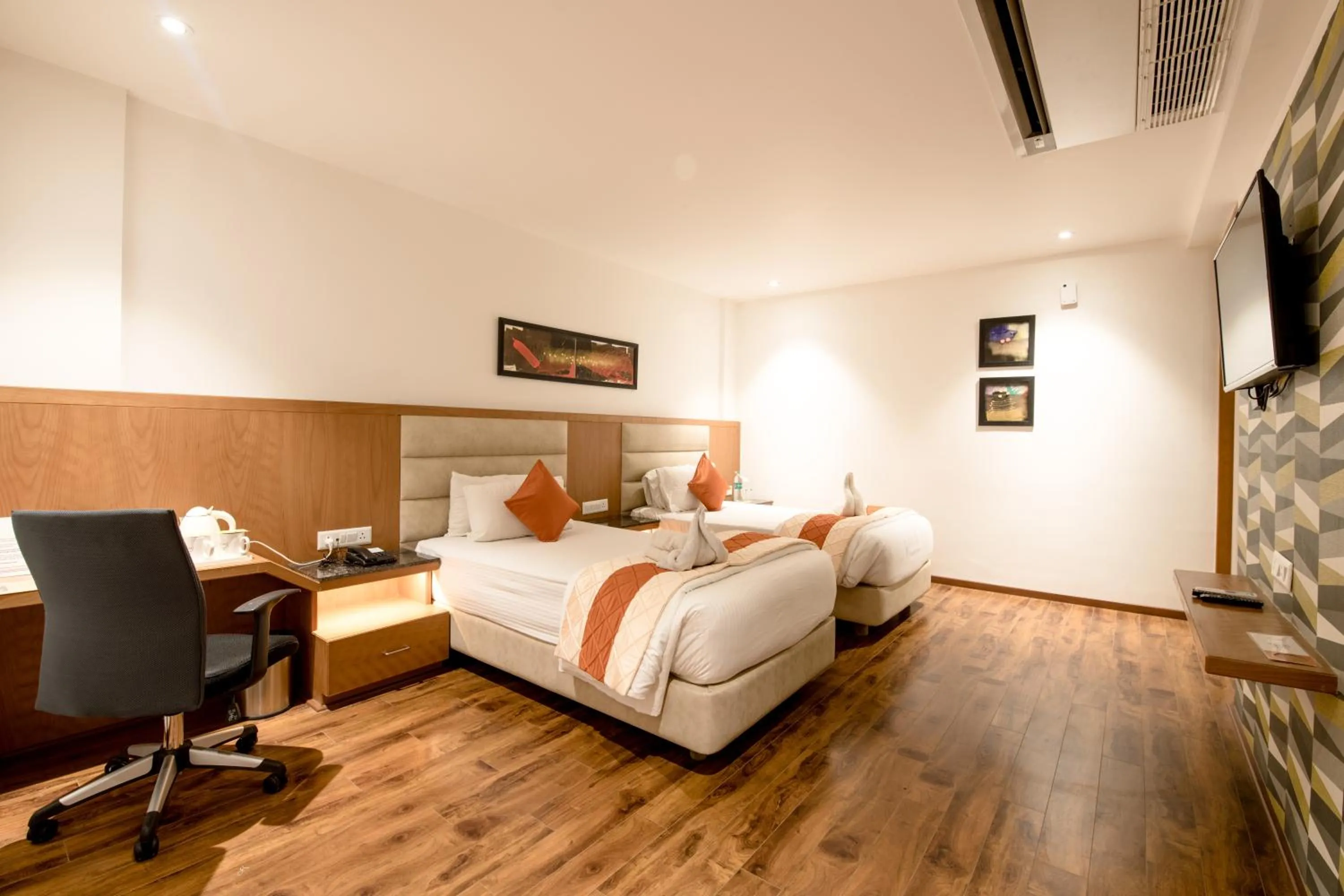 Bed in Kyriad Hotel Gulbarga by OTHPL