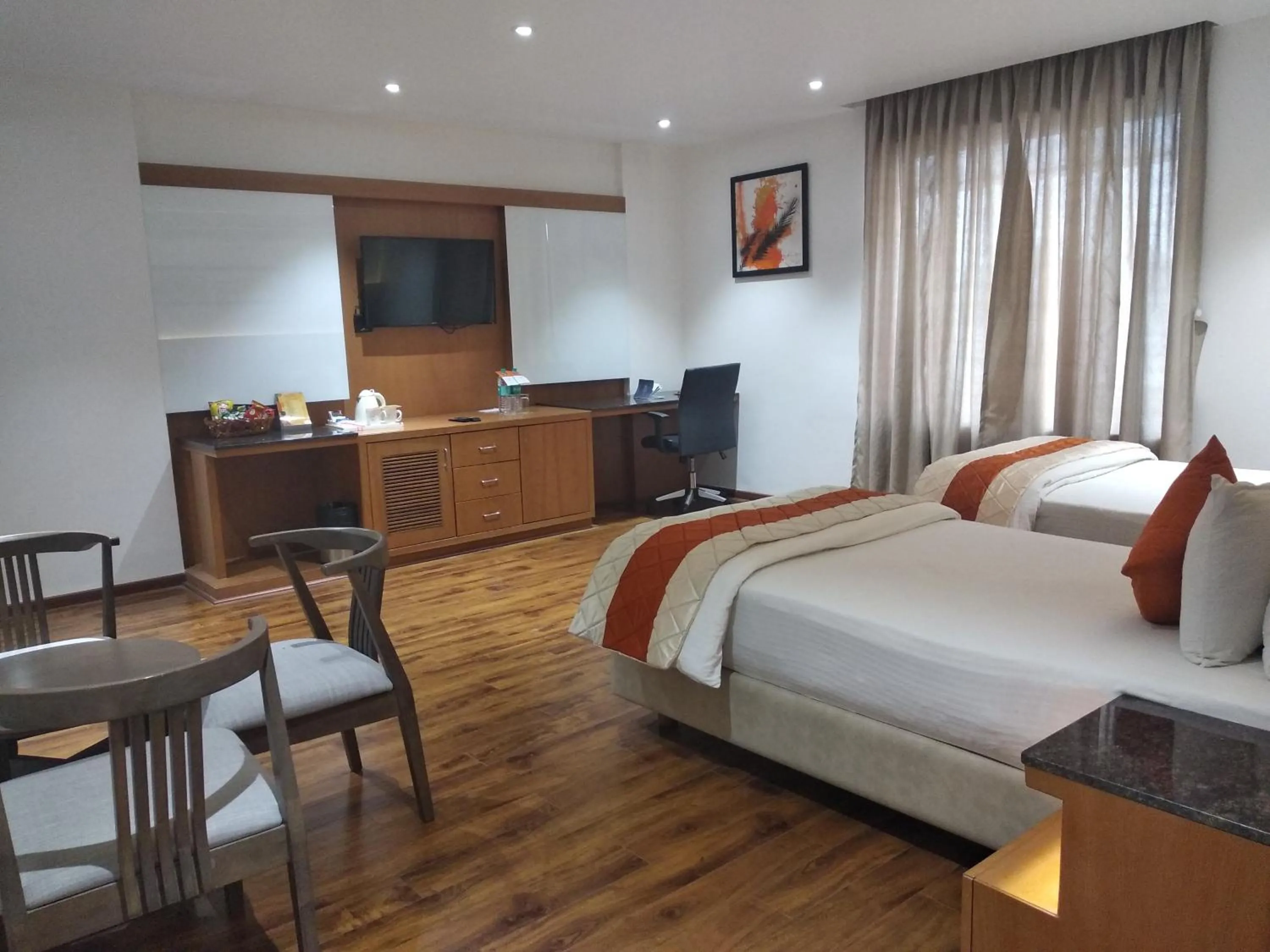 Bed in Kyriad Hotel Gulbarga by OTHPL