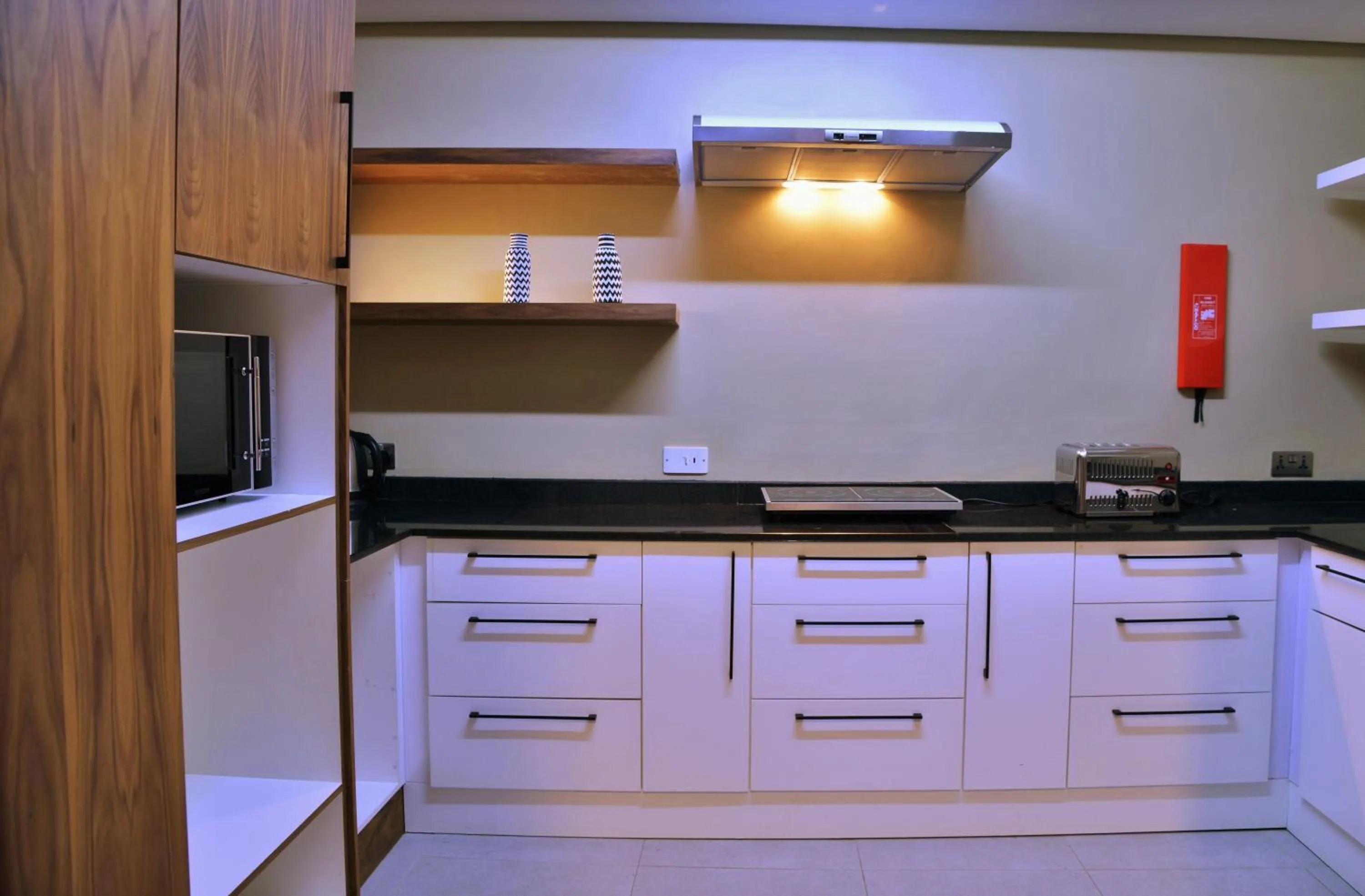 Kitchen or kitchenette in EPIC Hotel & Suites