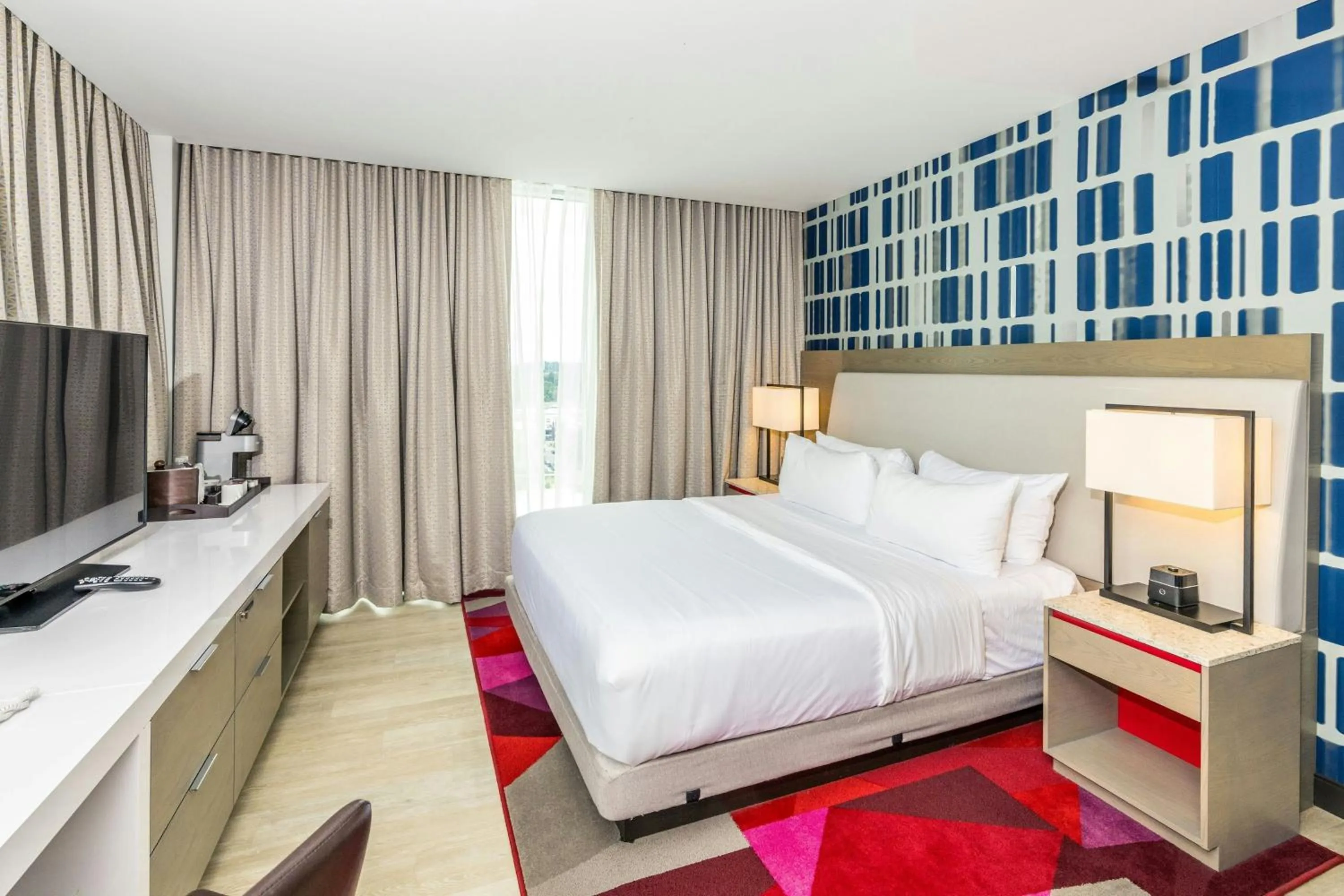 Photo of the whole room, Bed in The Summit Hotel