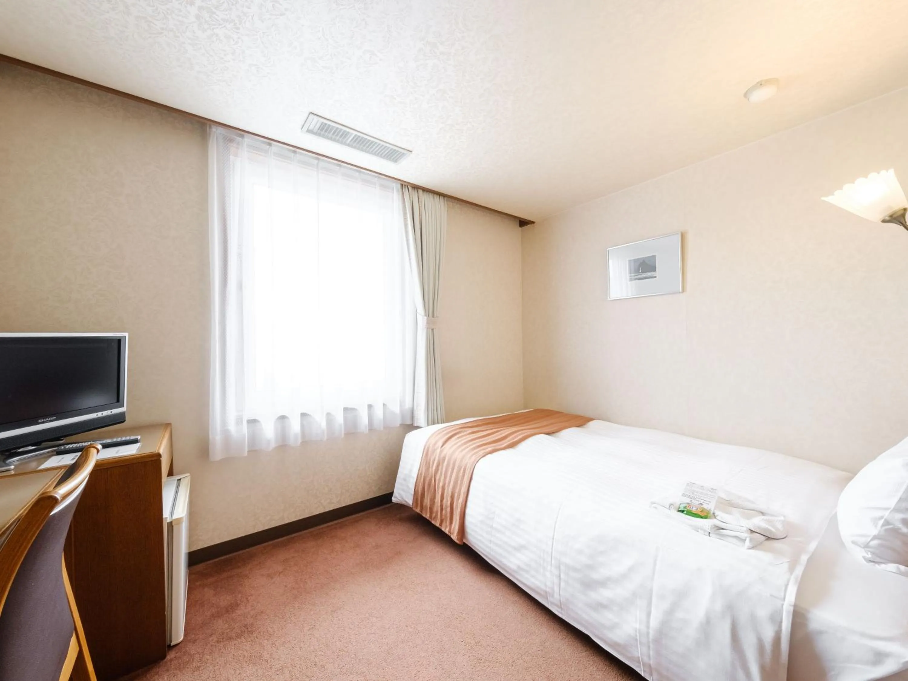 Bed in Tabist Abashiri Central Hotel