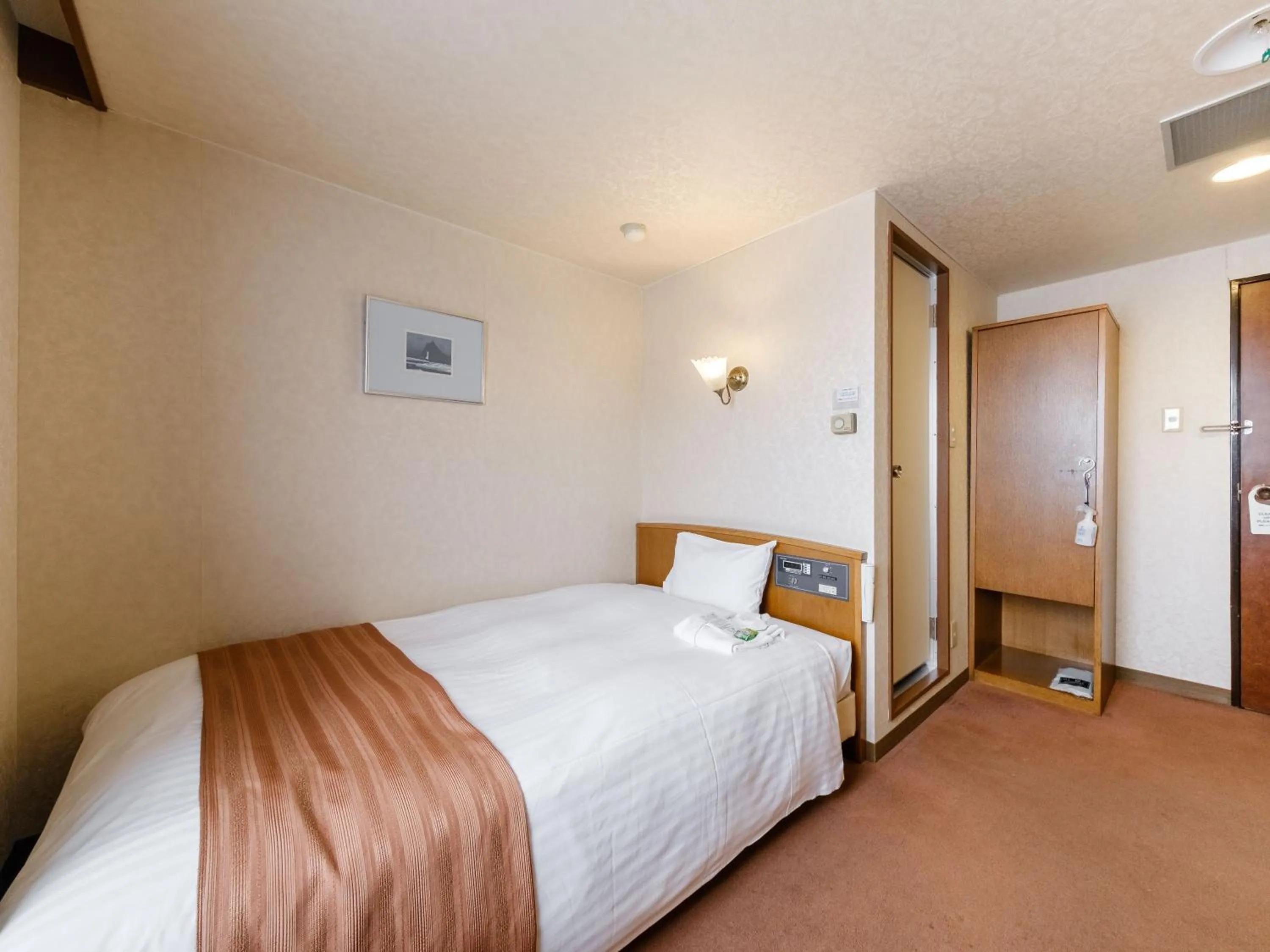 Bed in Tabist Abashiri Central Hotel